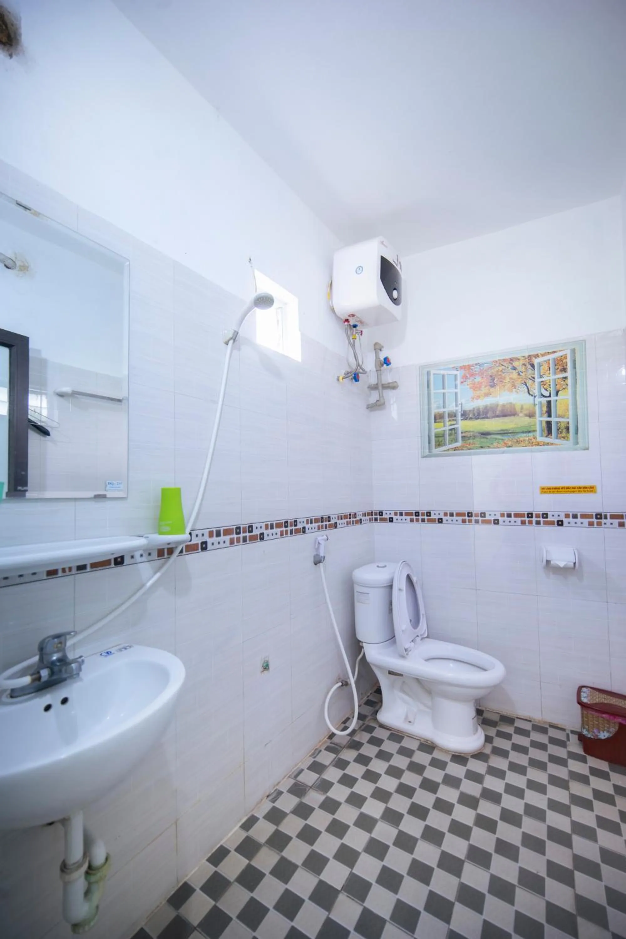 Toilet in Family Transit 2 Hotel