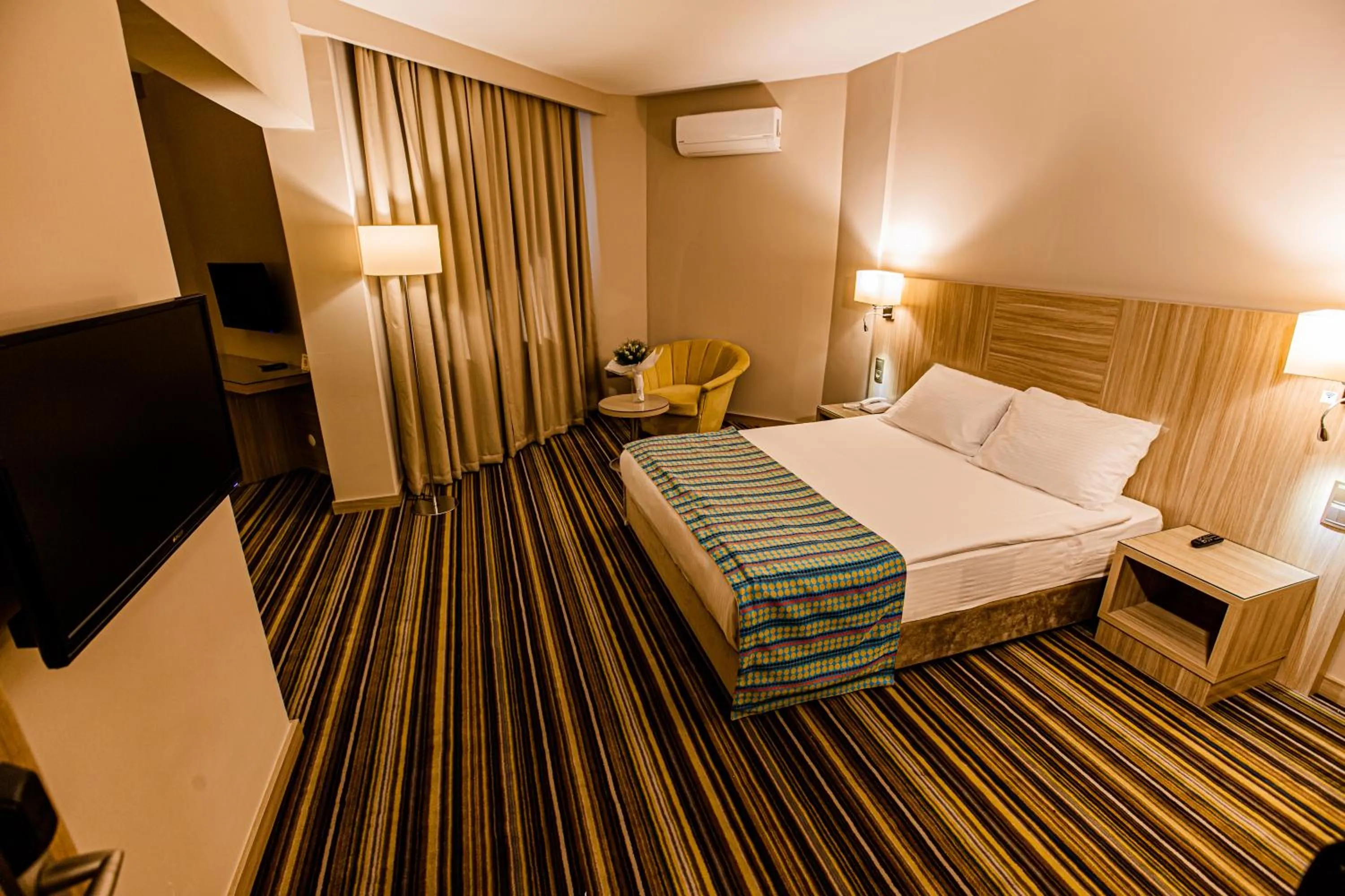 Bed in Mustafa Cappadocia Resort