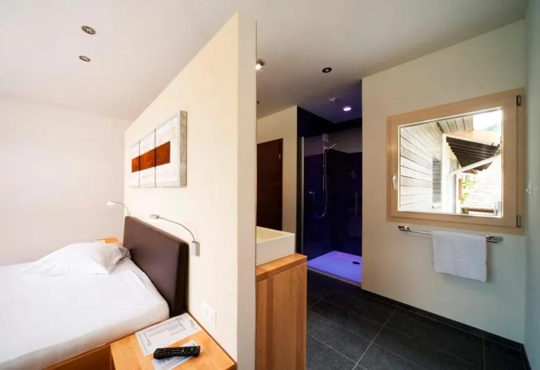 Photo of the whole room, Bed in Hôtel de l'Etoile