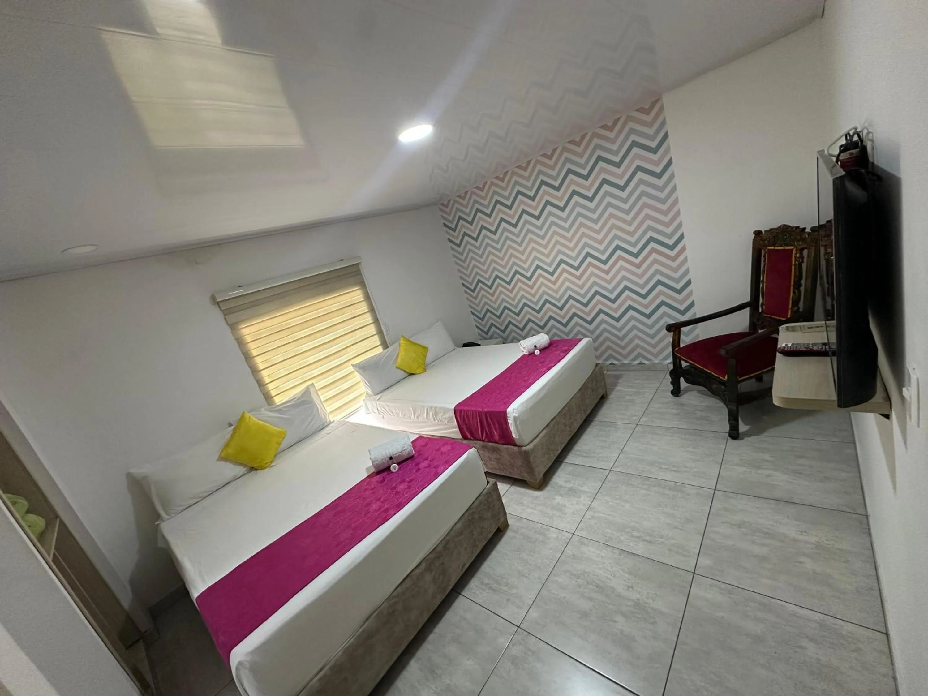 Bed in Hotel Millenium Victoria Plaza