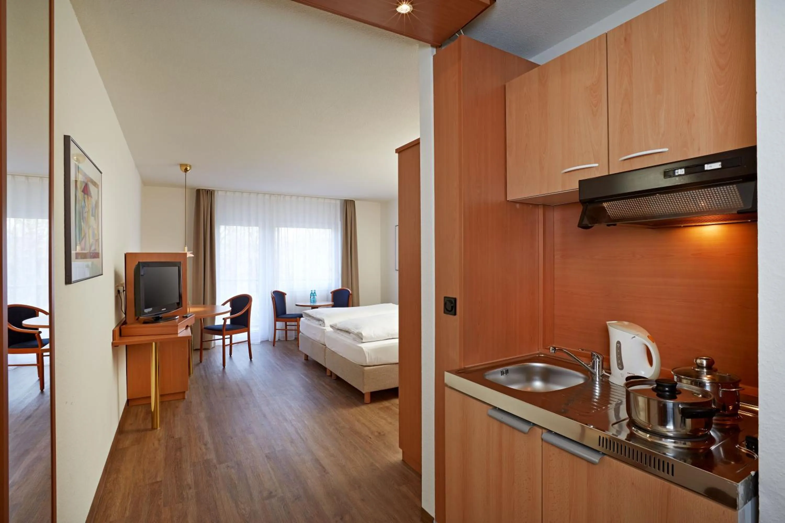 Kitchen or kitchenette, Bed in Micador Appartementhaus