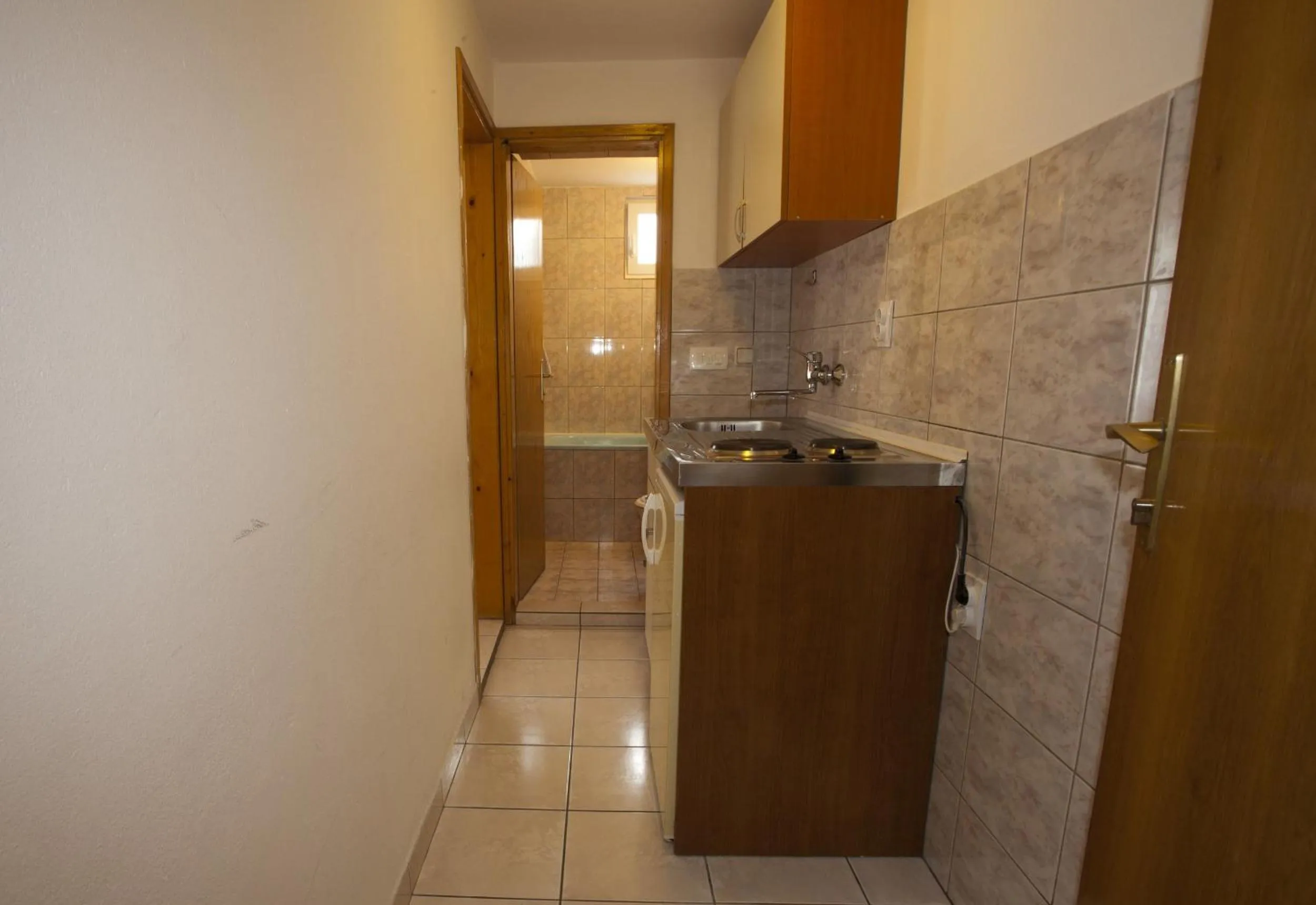 Kitchen or kitchenette in Apartments Memidz