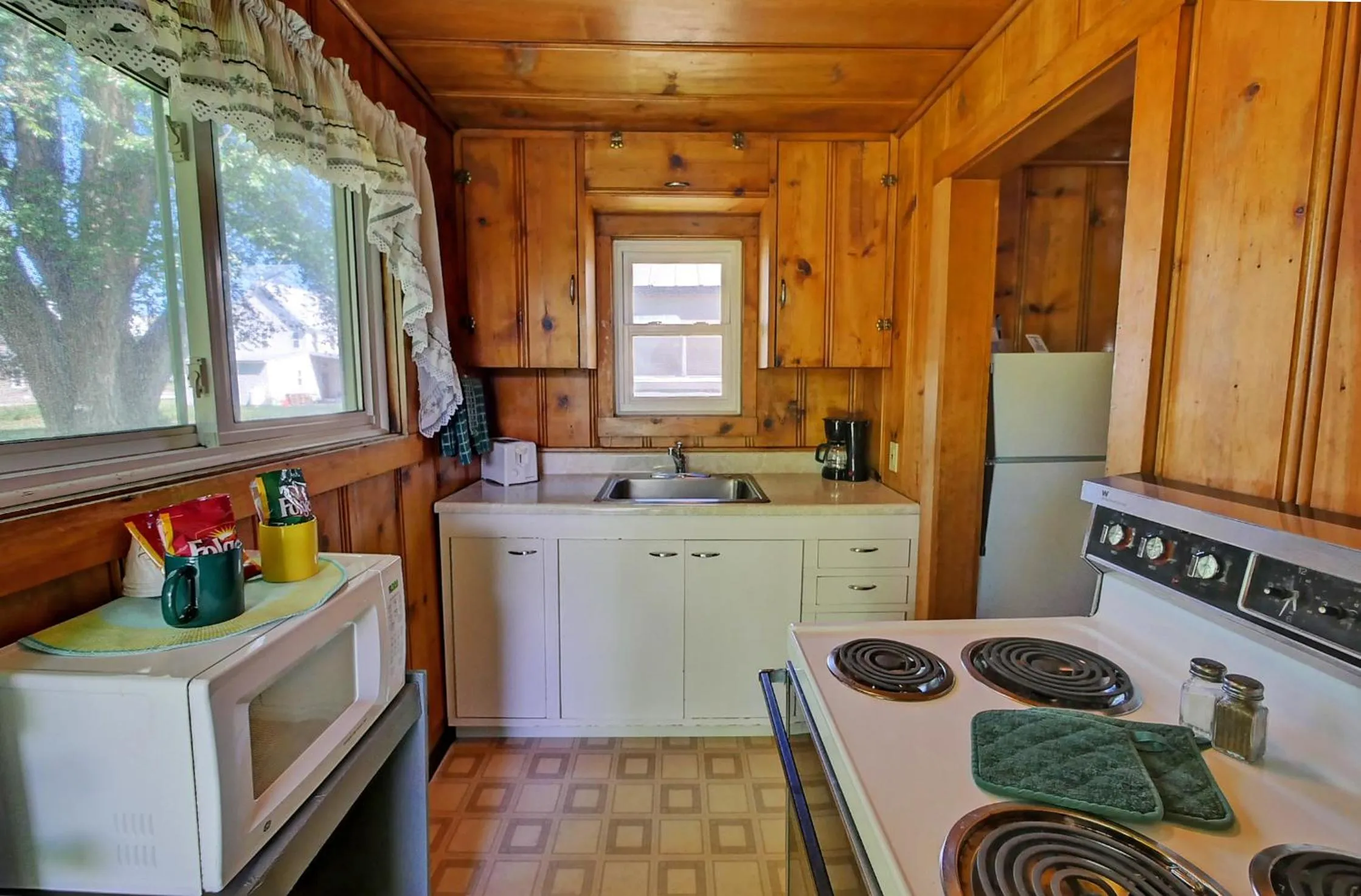 Kitchen or kitchenette in Idle A While Cabins