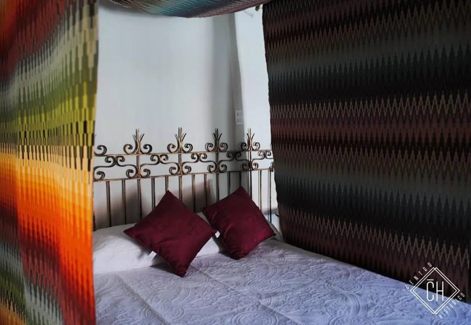 Bed in Doroteo Hotel Boutique