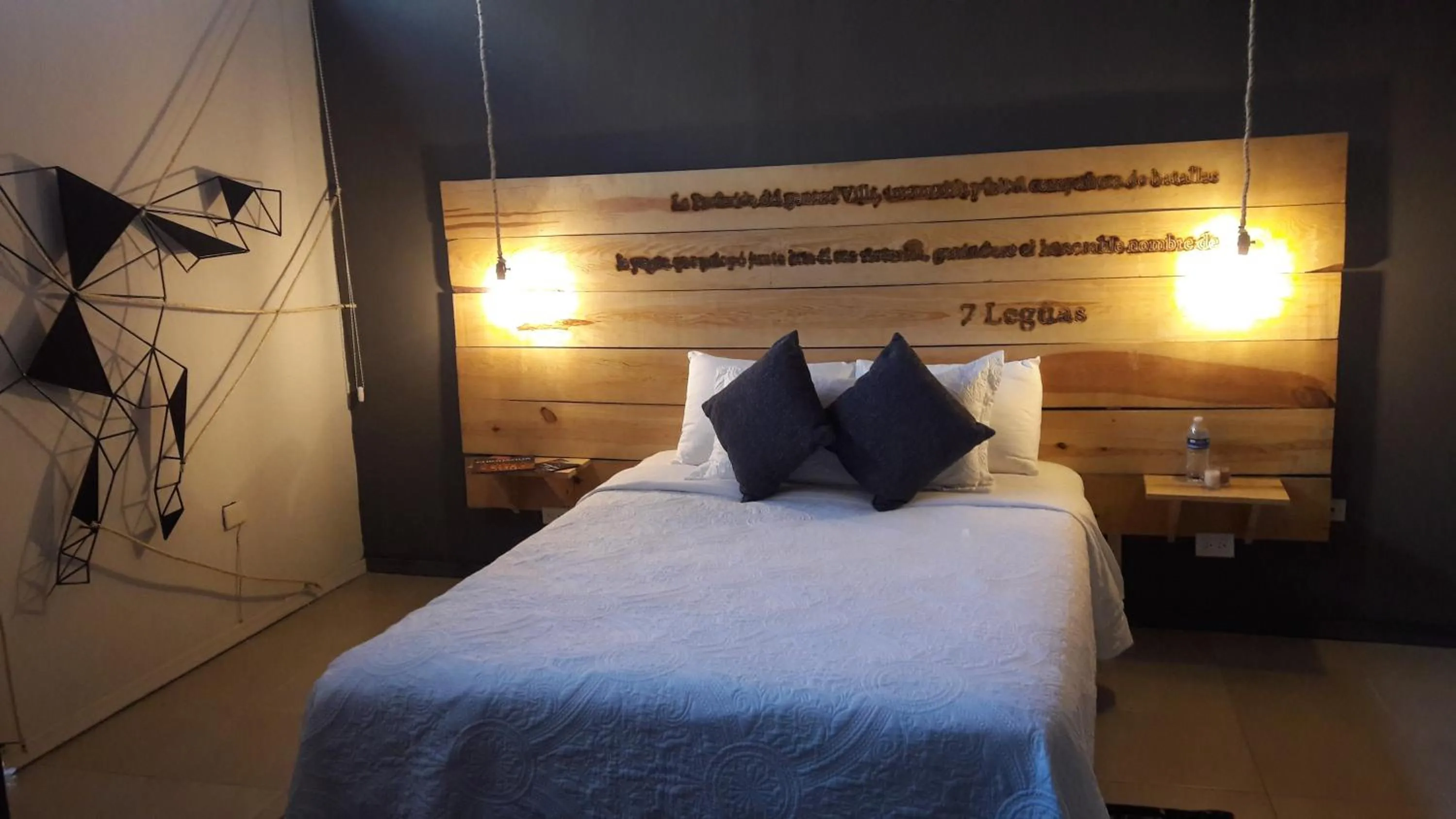 Bed in Doroteo Hotel Boutique