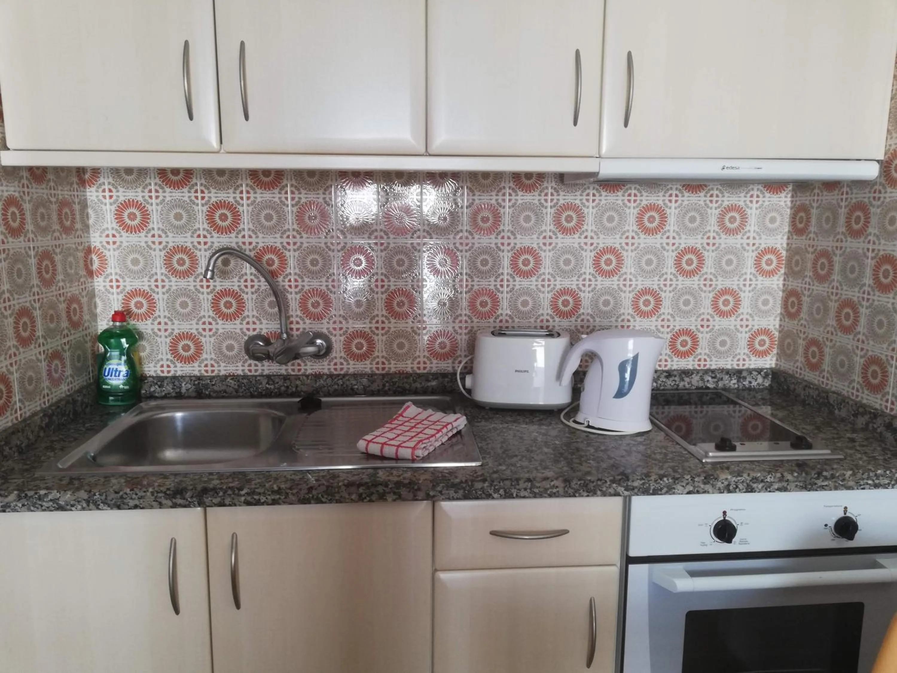 Kitchen or kitchenette in Apartamentos Orvay