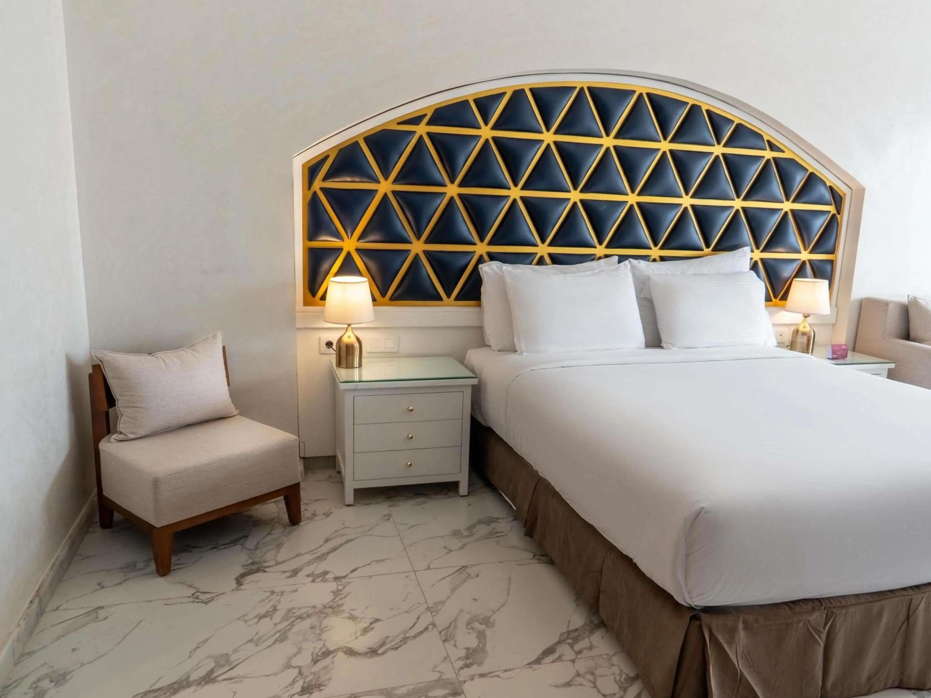 Bedroom, Bed in Movenpick Resort Sharm El Sheikh