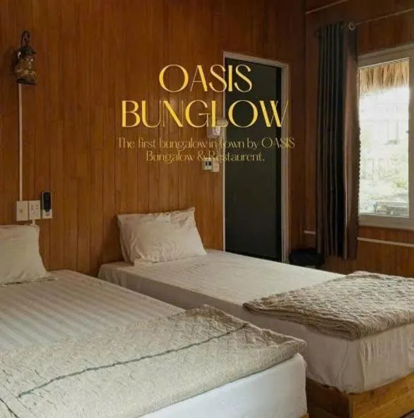 Bed in Catba Oasis Bungalows