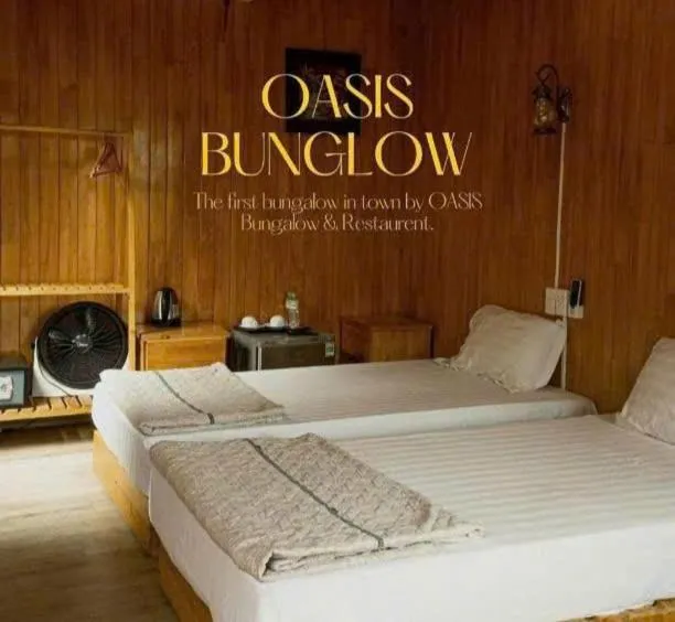Bed in Catba Oasis Bungalows