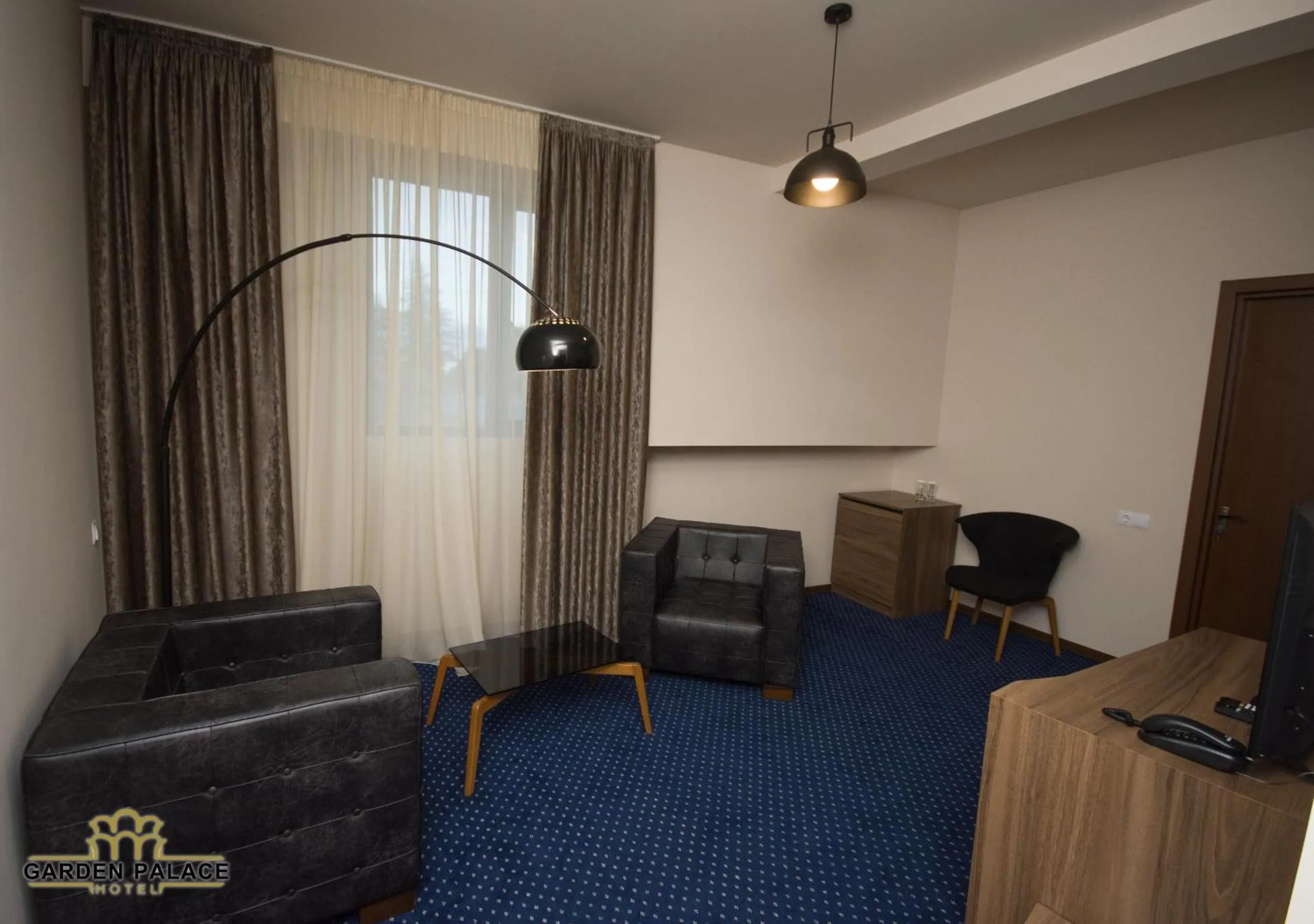 Communal lounge/ TV room in Garden Palace