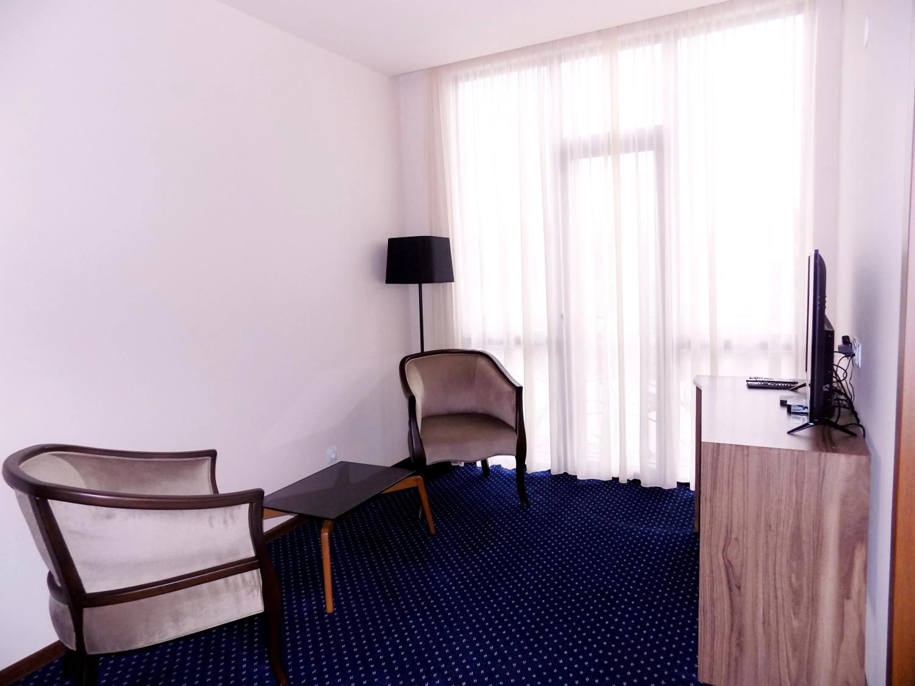 Communal lounge/ TV room in Garden Palace