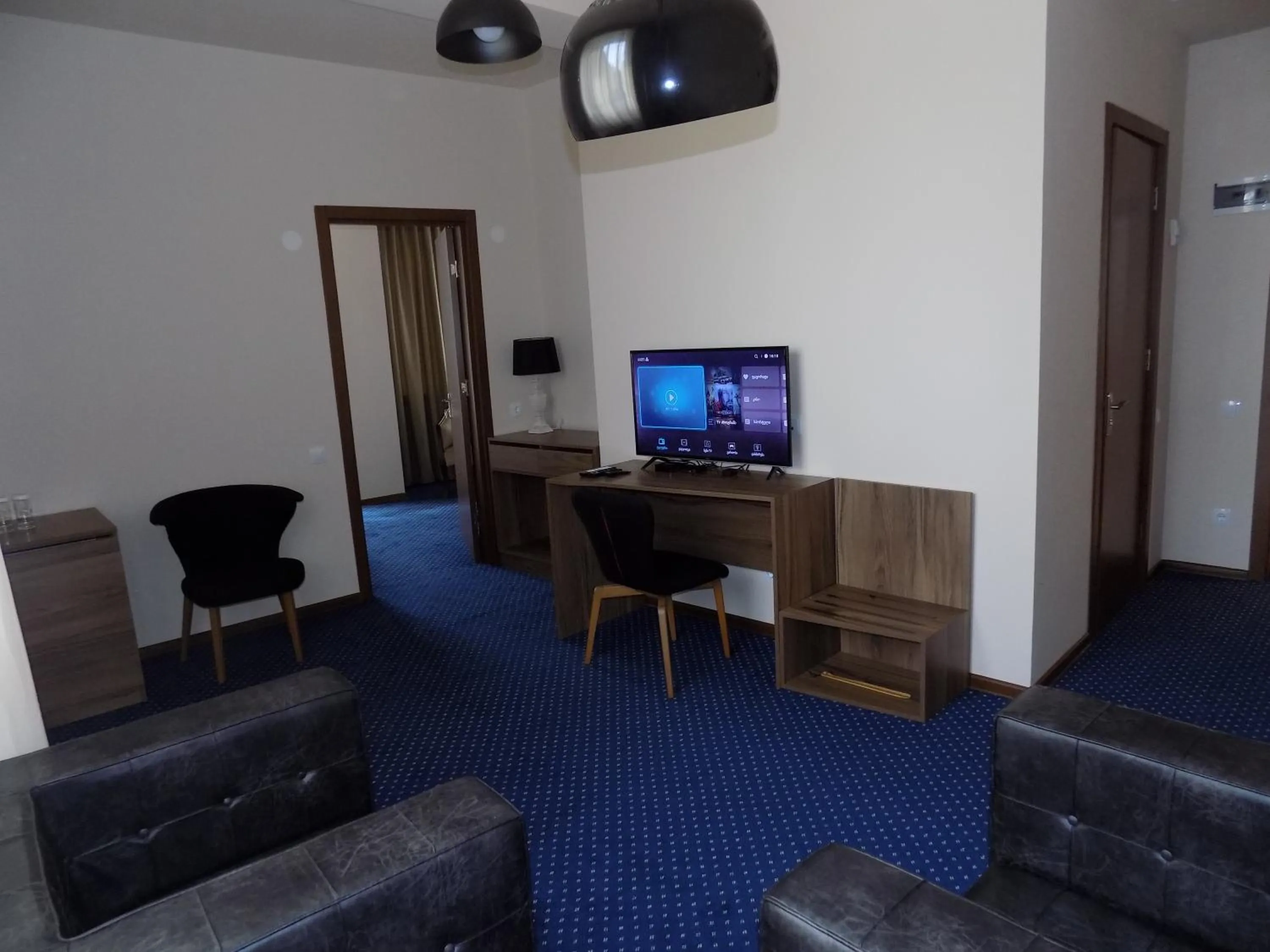 Communal lounge/ TV room in Garden Palace