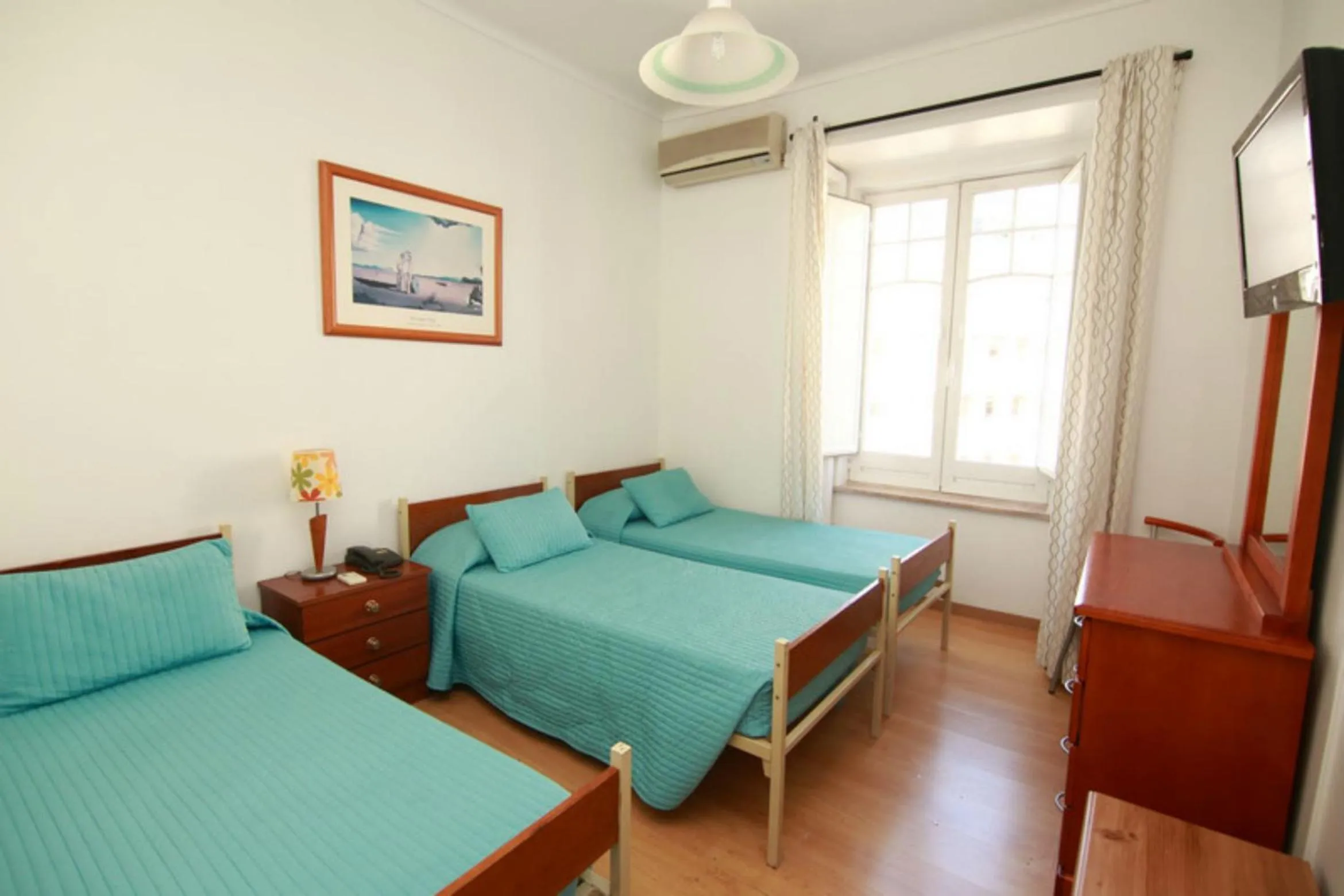 Photo of the whole room, Bed in Residencial Joao XXI