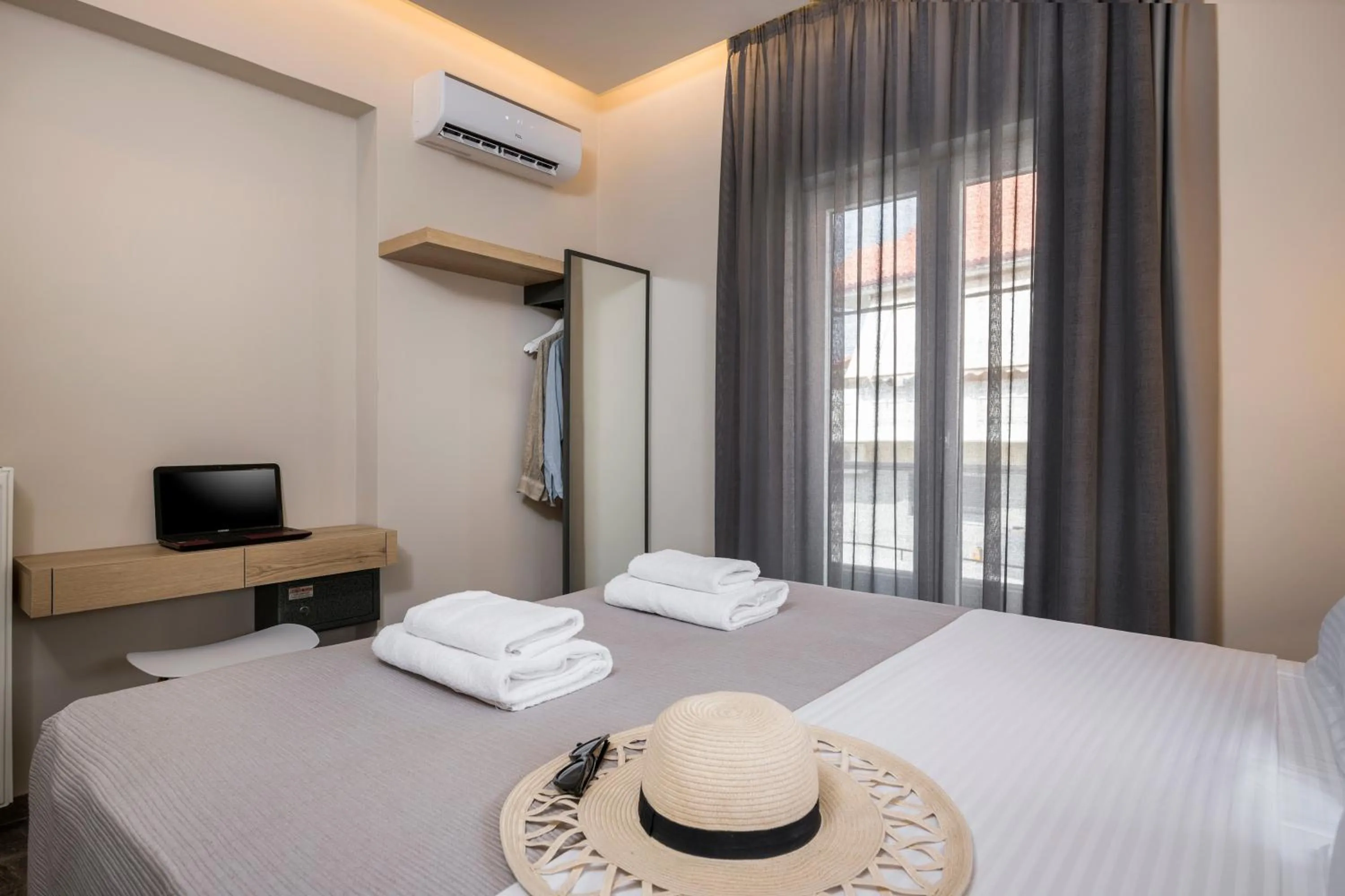 Bed in Sun Ray Luxury Apartments