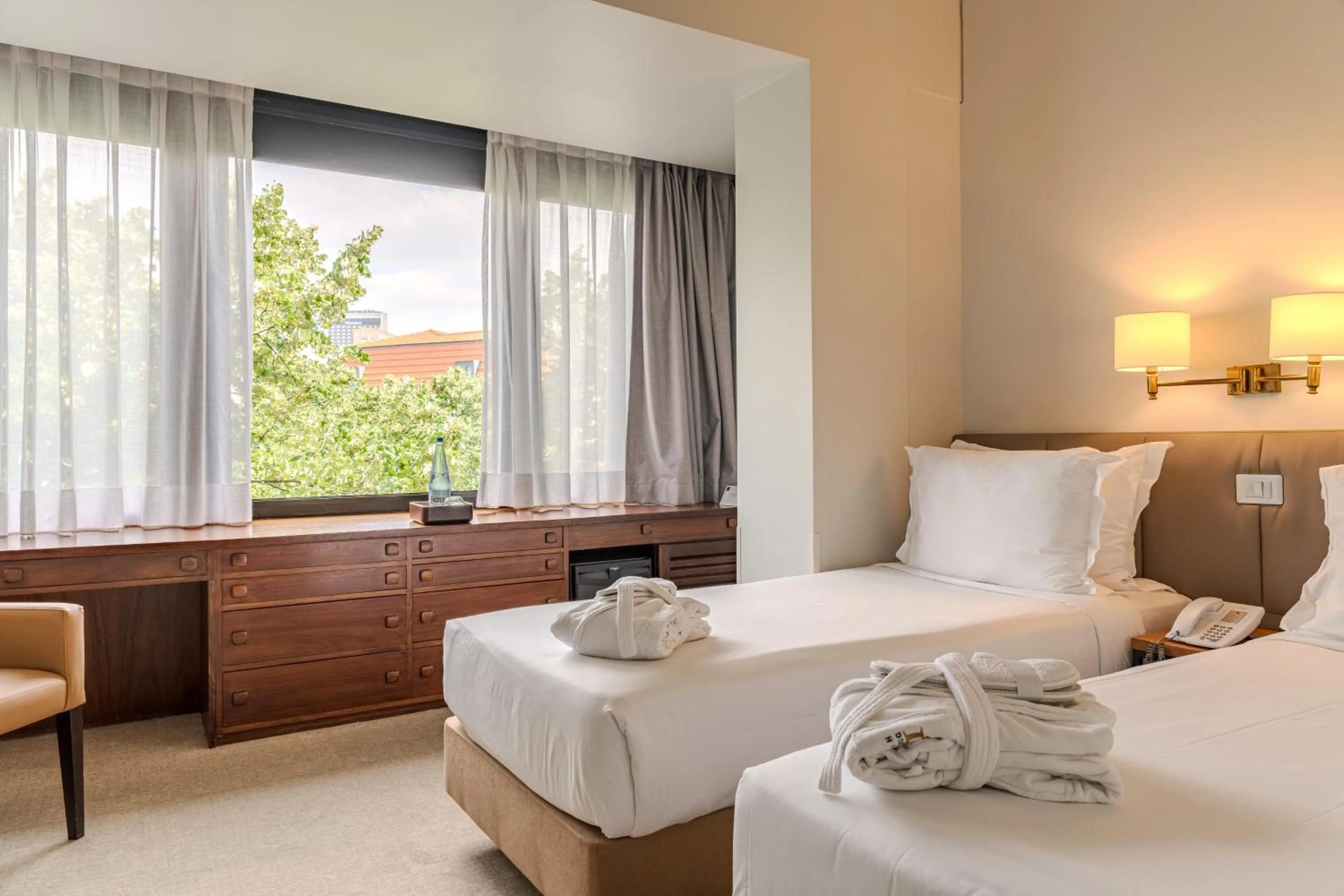 Bed in Hotel Dom Carlos Park