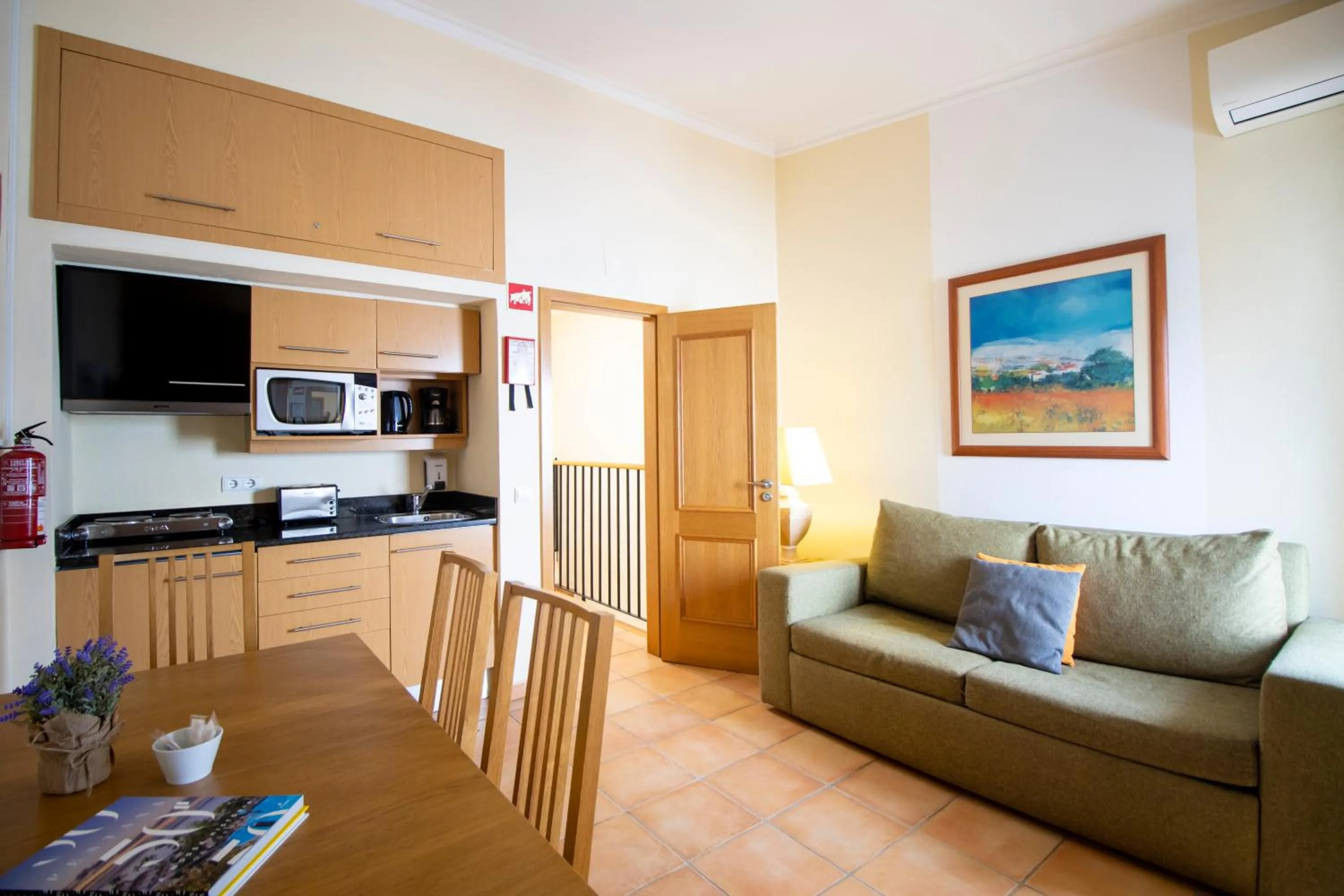 Communal lounge/ TV room in Pestana Palm Gardens