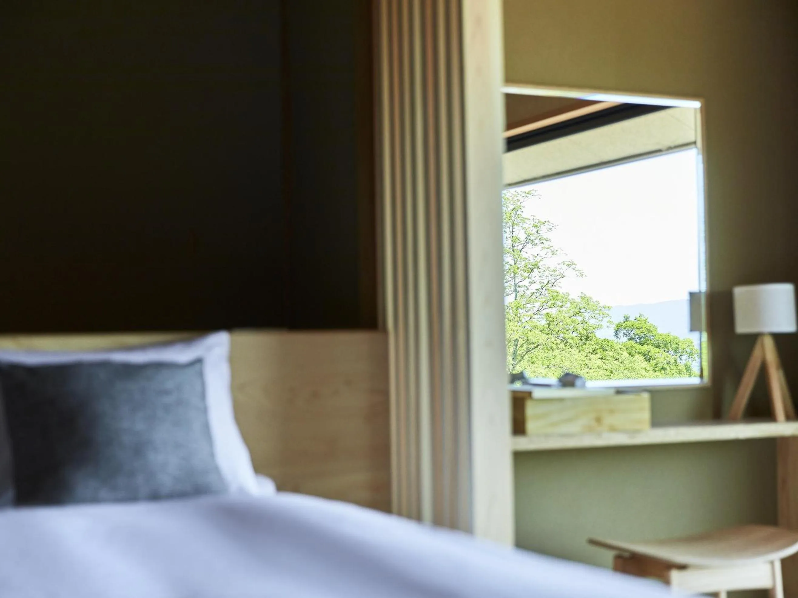 Bed in ANDO HOTEL NARA Wakakusayama -DLIGHT LIFE & HOTELS-