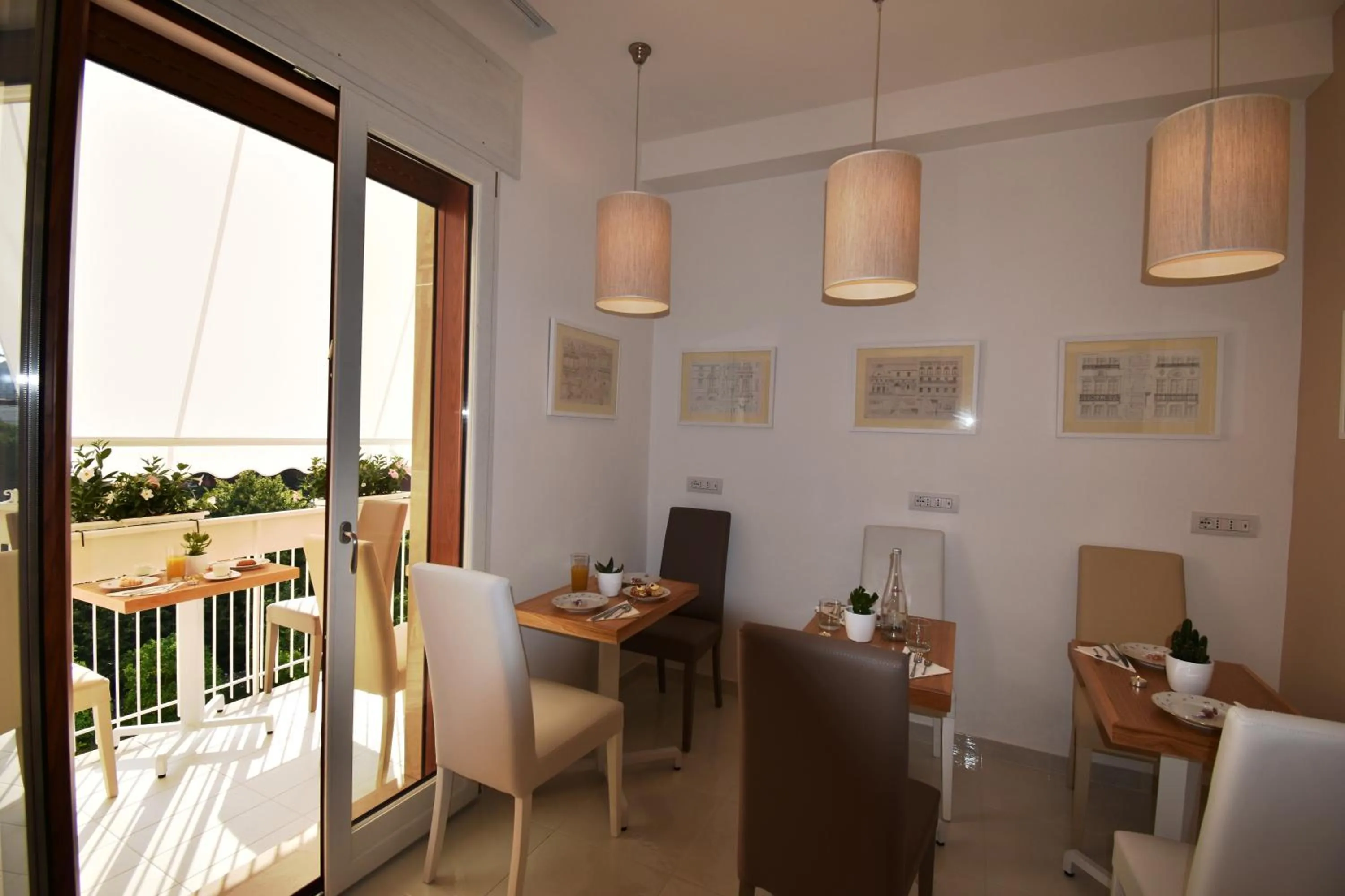 Communal lounge/ TV room in Melody Sorrento Suites