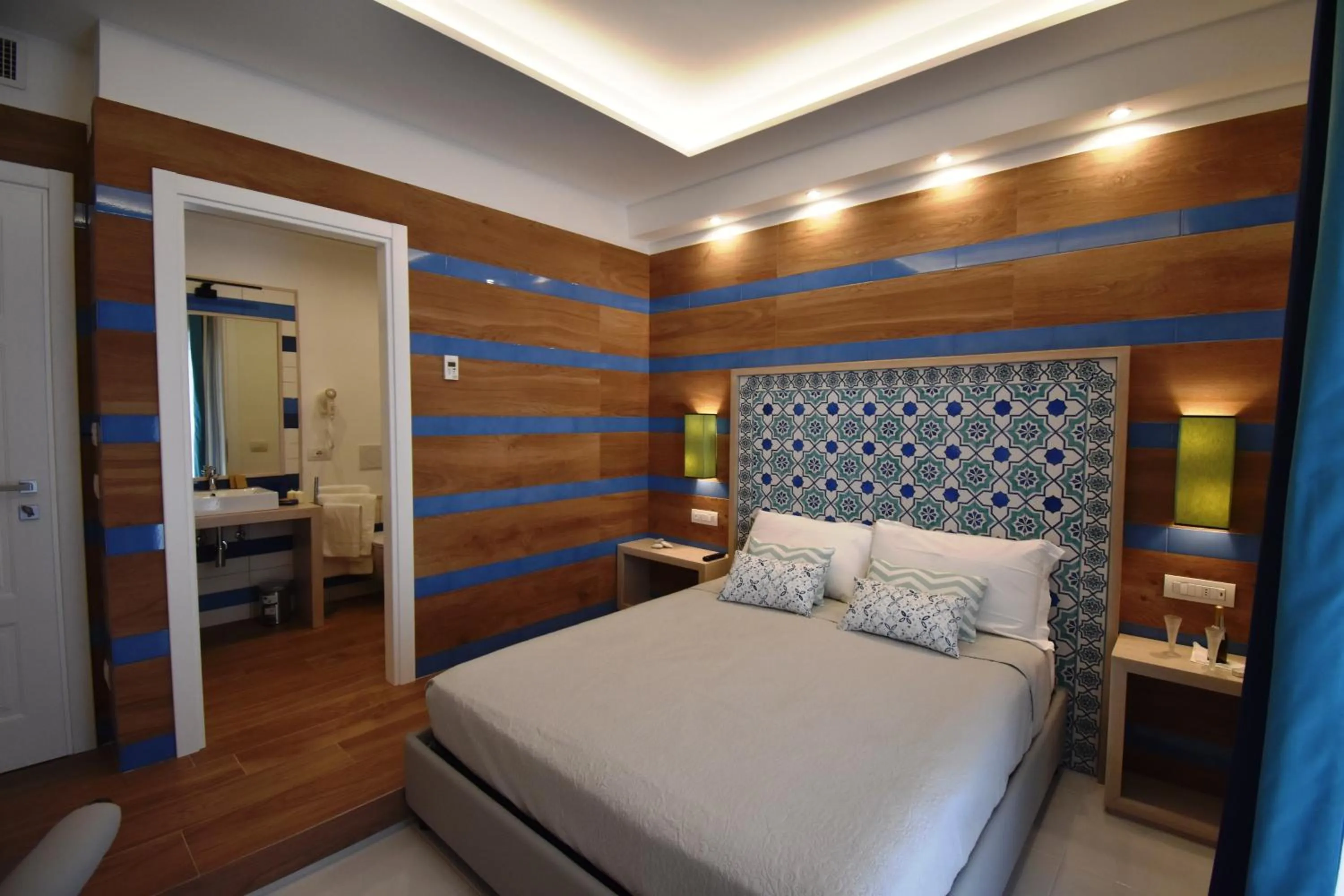 Photo of the whole room, Bed in Melody Sorrento Suites