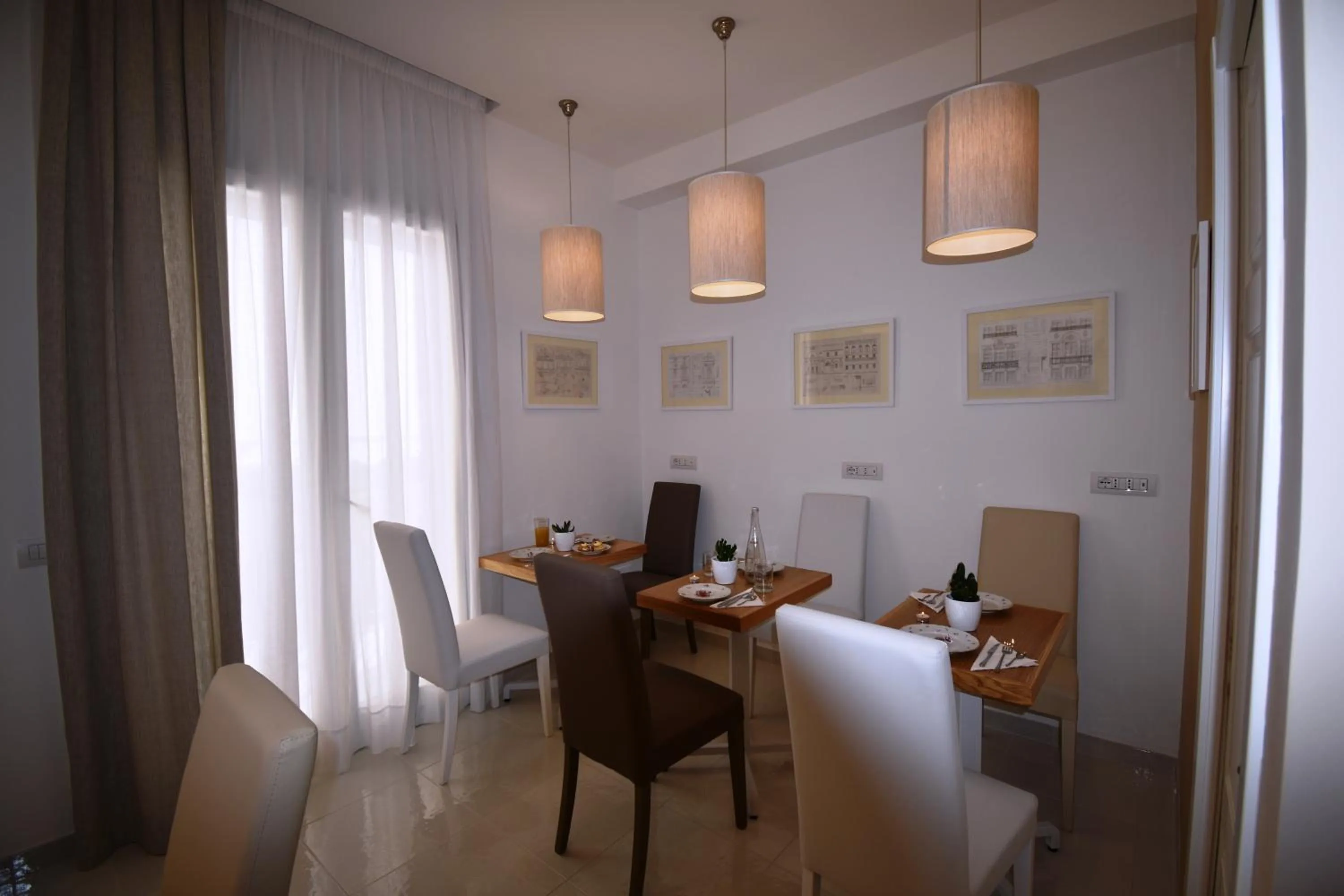 Communal lounge/ TV room in Melody Sorrento Suites