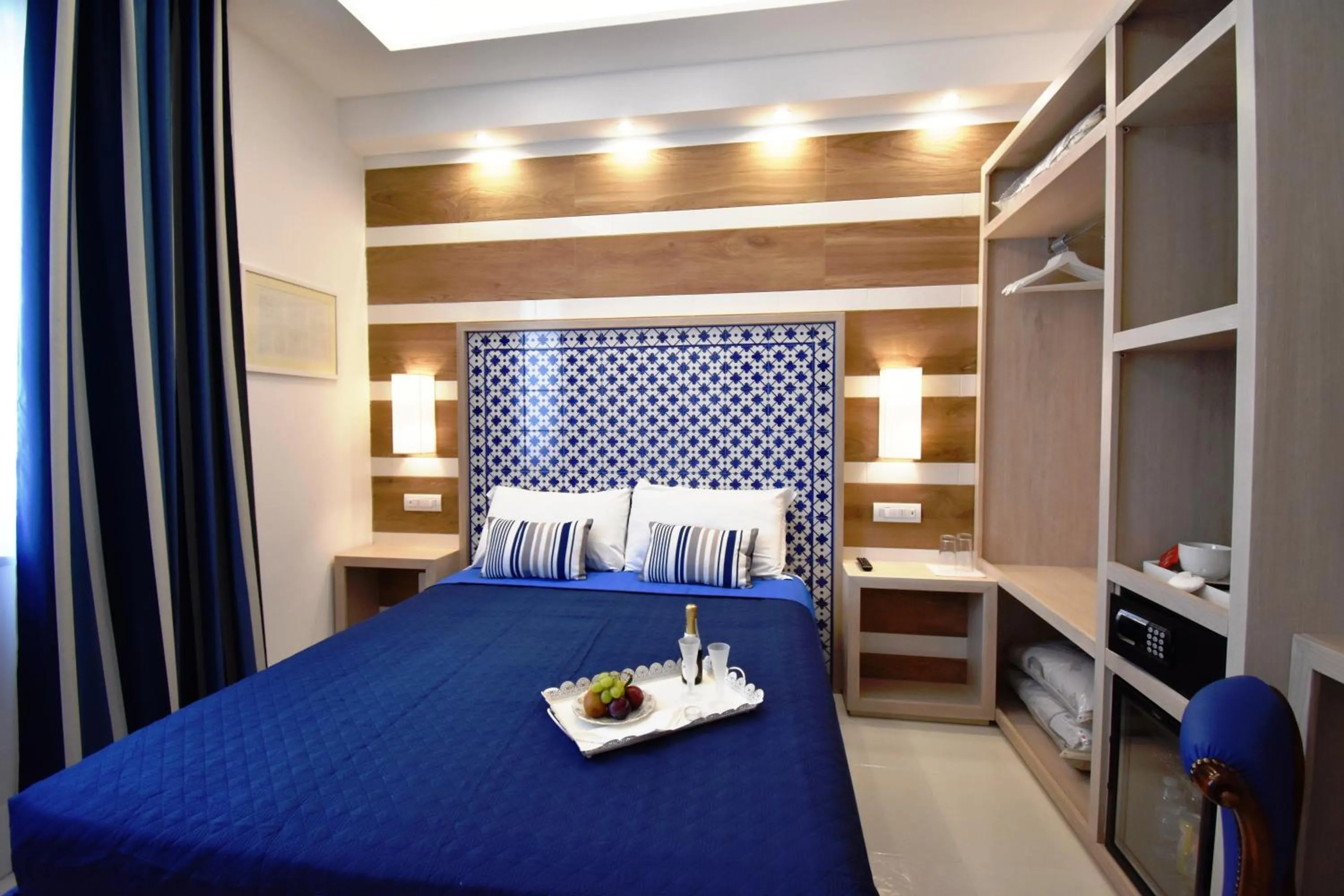 Photo of the whole room, Bed in Melody Sorrento Suites