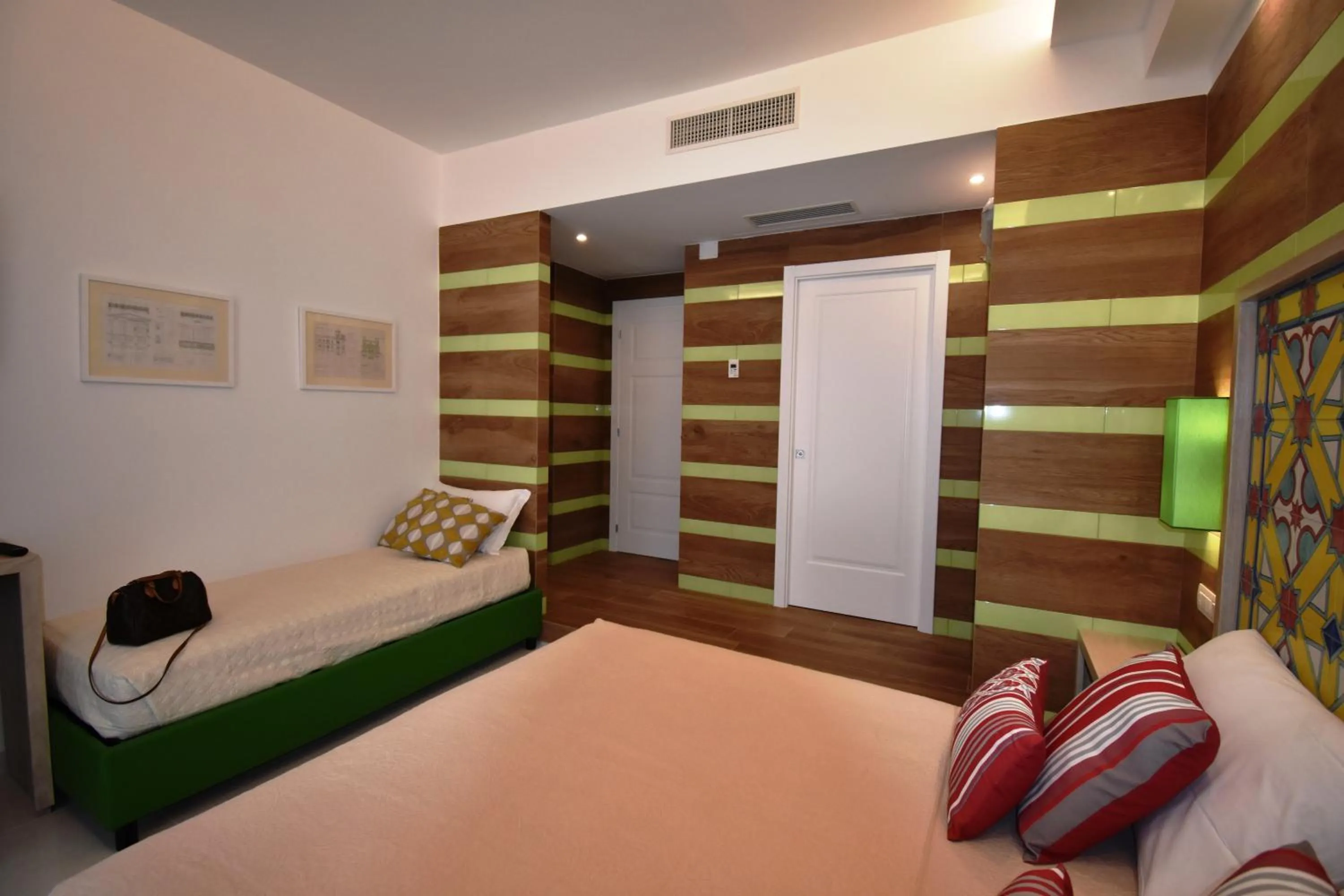 Photo of the whole room, Bed in Melody Sorrento Suites