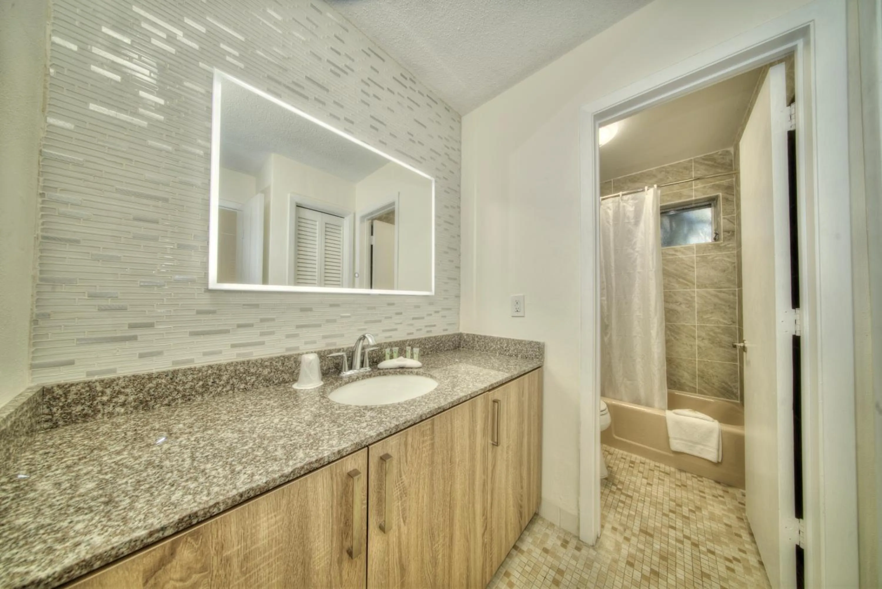 Bathroom in Club Lux Resort By The Beach