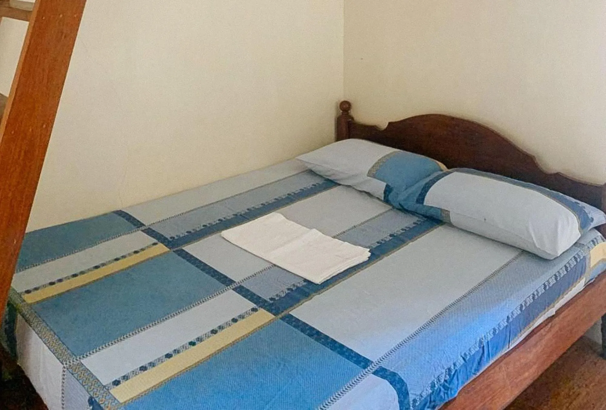Bed in UrbanView BNKY Bed and Breakfast Palawan by RedDoorz