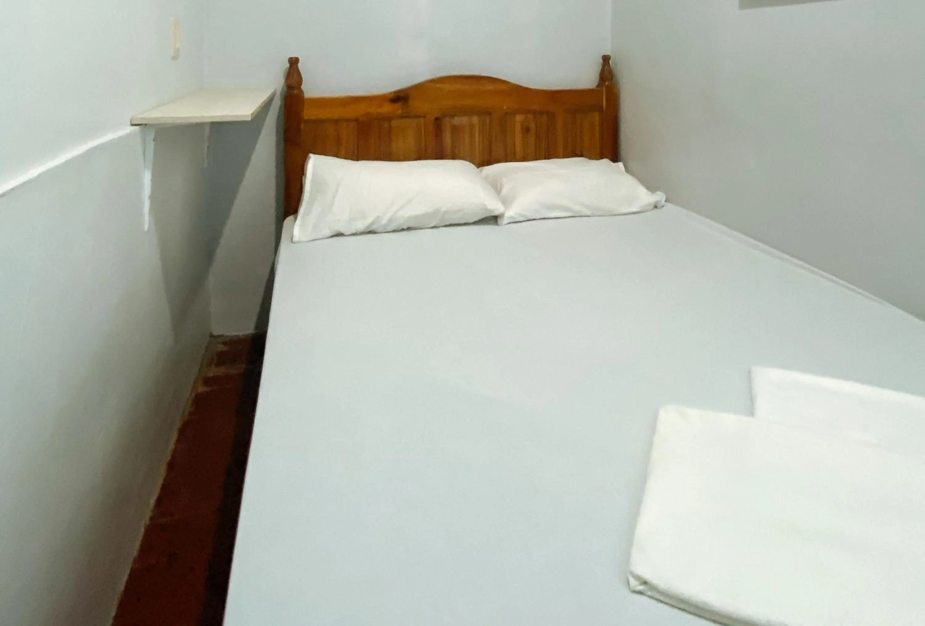 Photo of the whole room in UrbanView BNKY Bed and Breakfast Palawan by RedDoorz