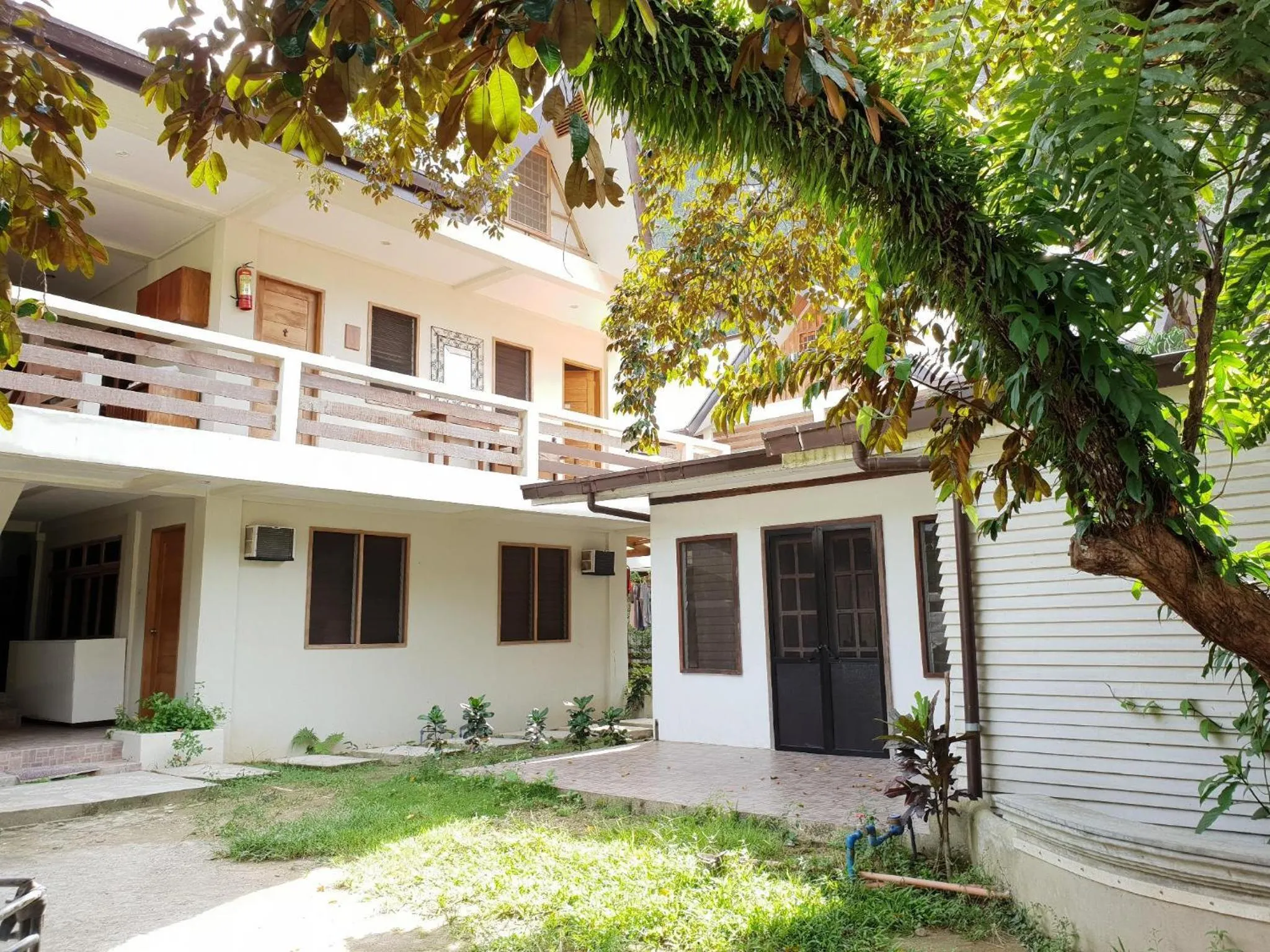 Property building in UrbanView BNKY Bed and Breakfast Palawan by RedDoorz