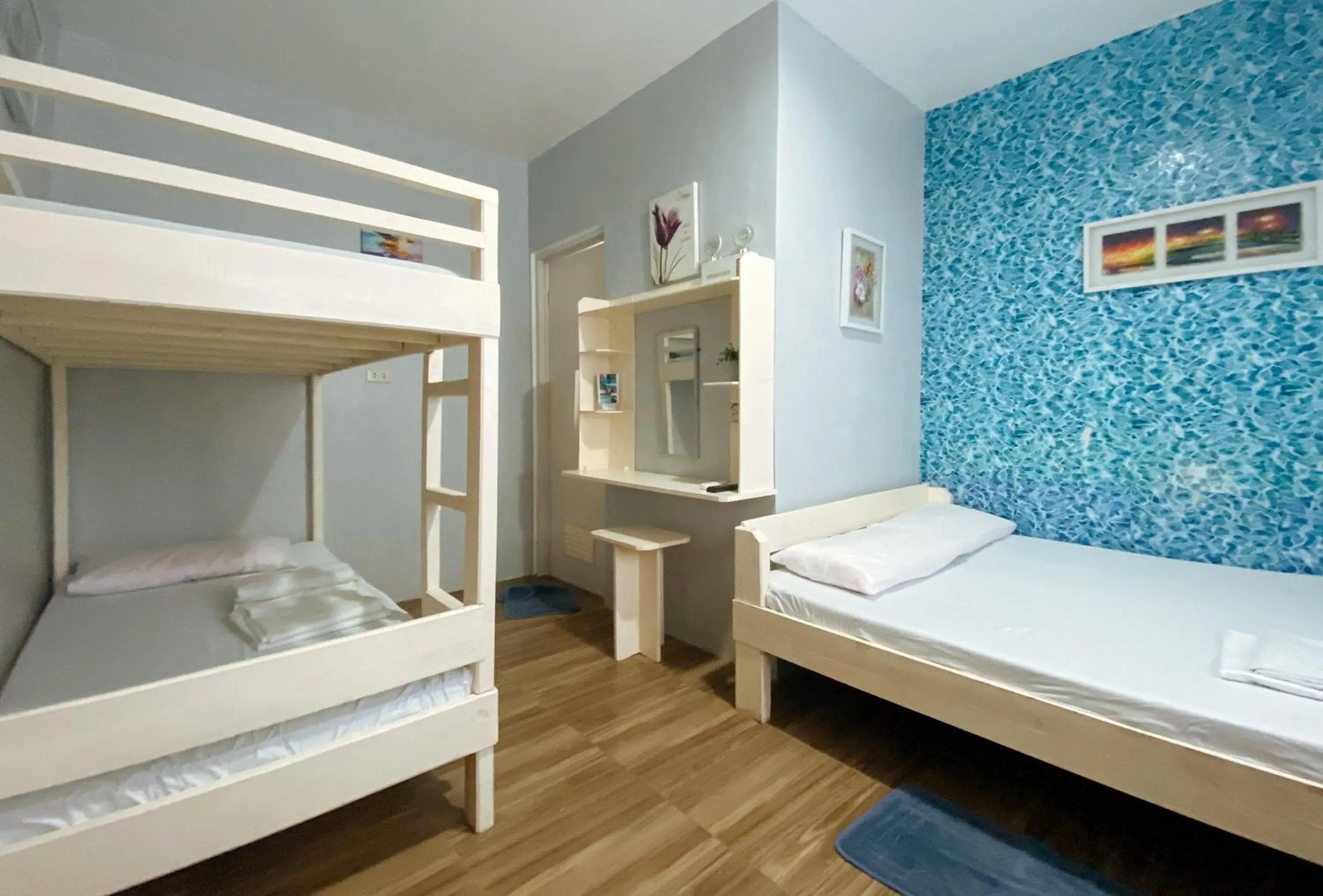 Photo of the whole room in UrbanView BNKY Bed and Breakfast Palawan by RedDoorz