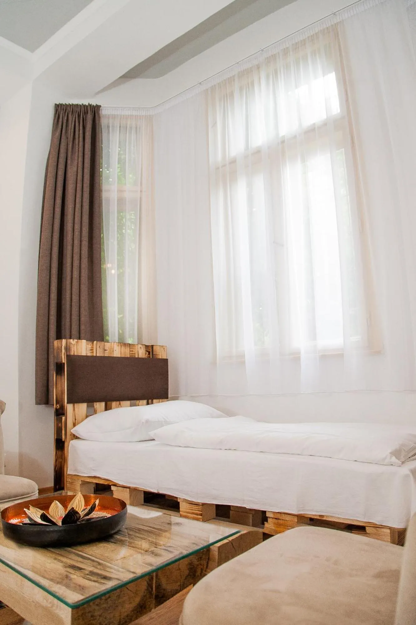 Living room, Bed in Hotel Carpe Diem