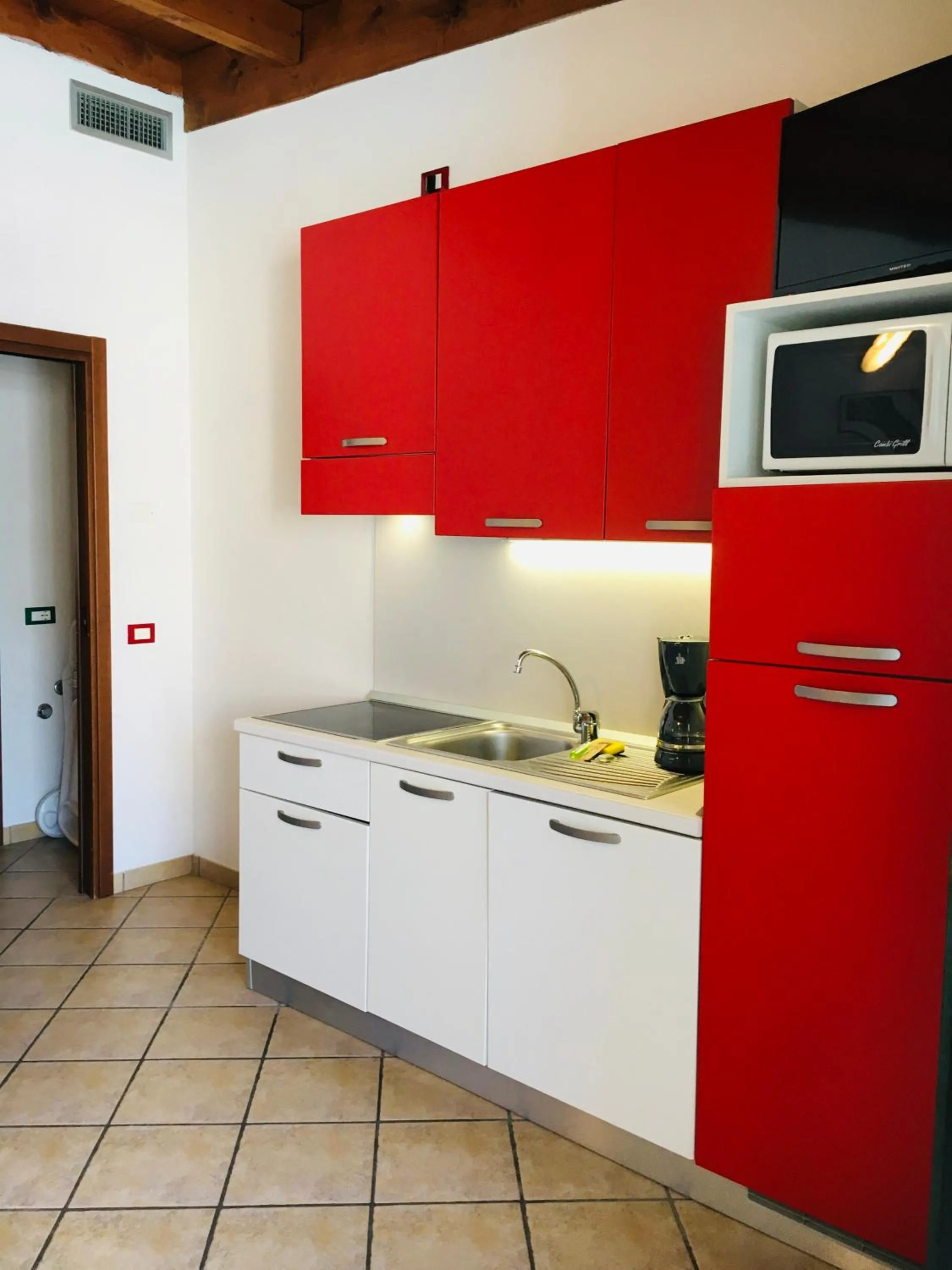 Kitchen or kitchenette in Michelangelo Holiday & Family Resort