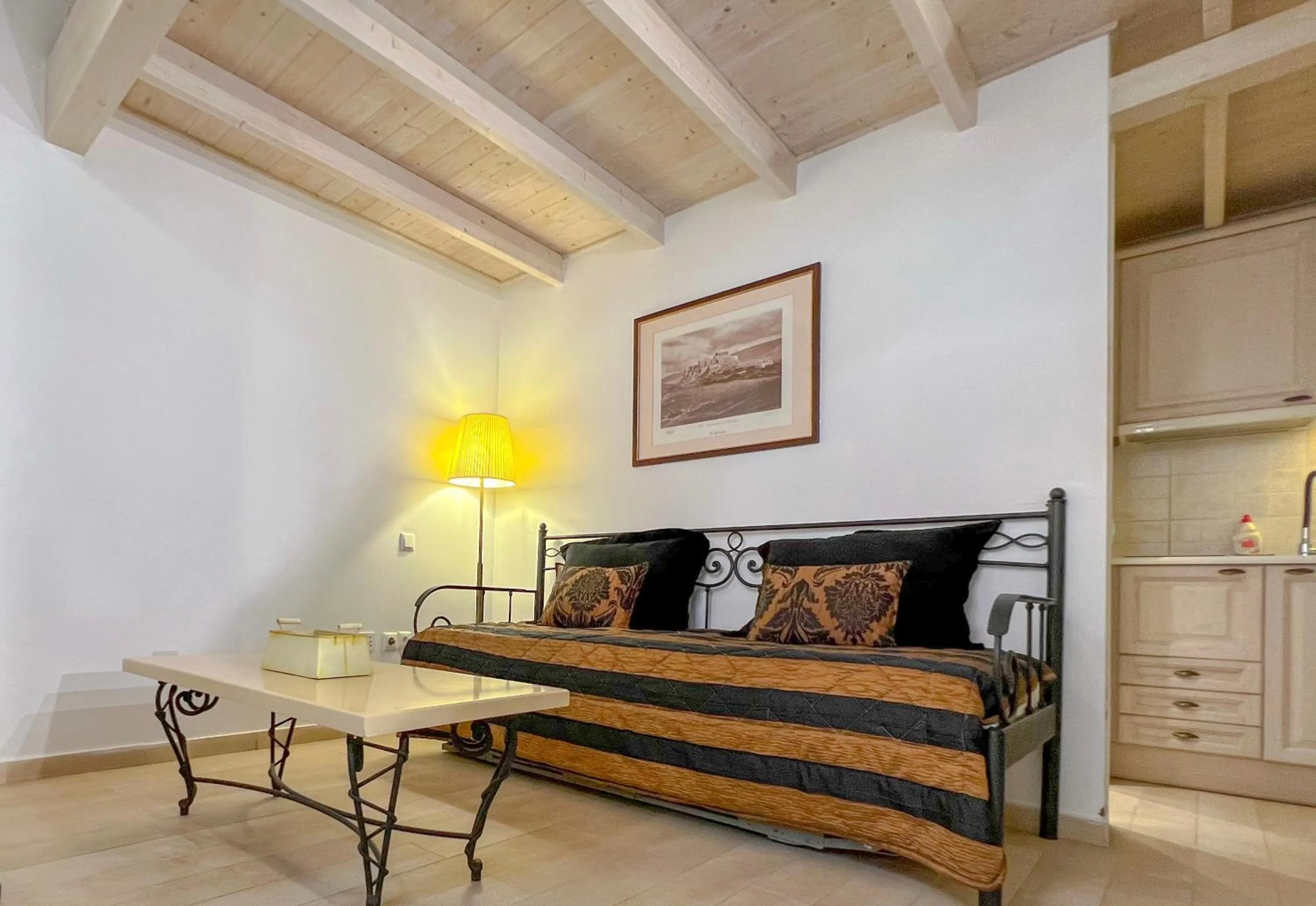 Living room, Bed in PortaDelMare deluxe suites