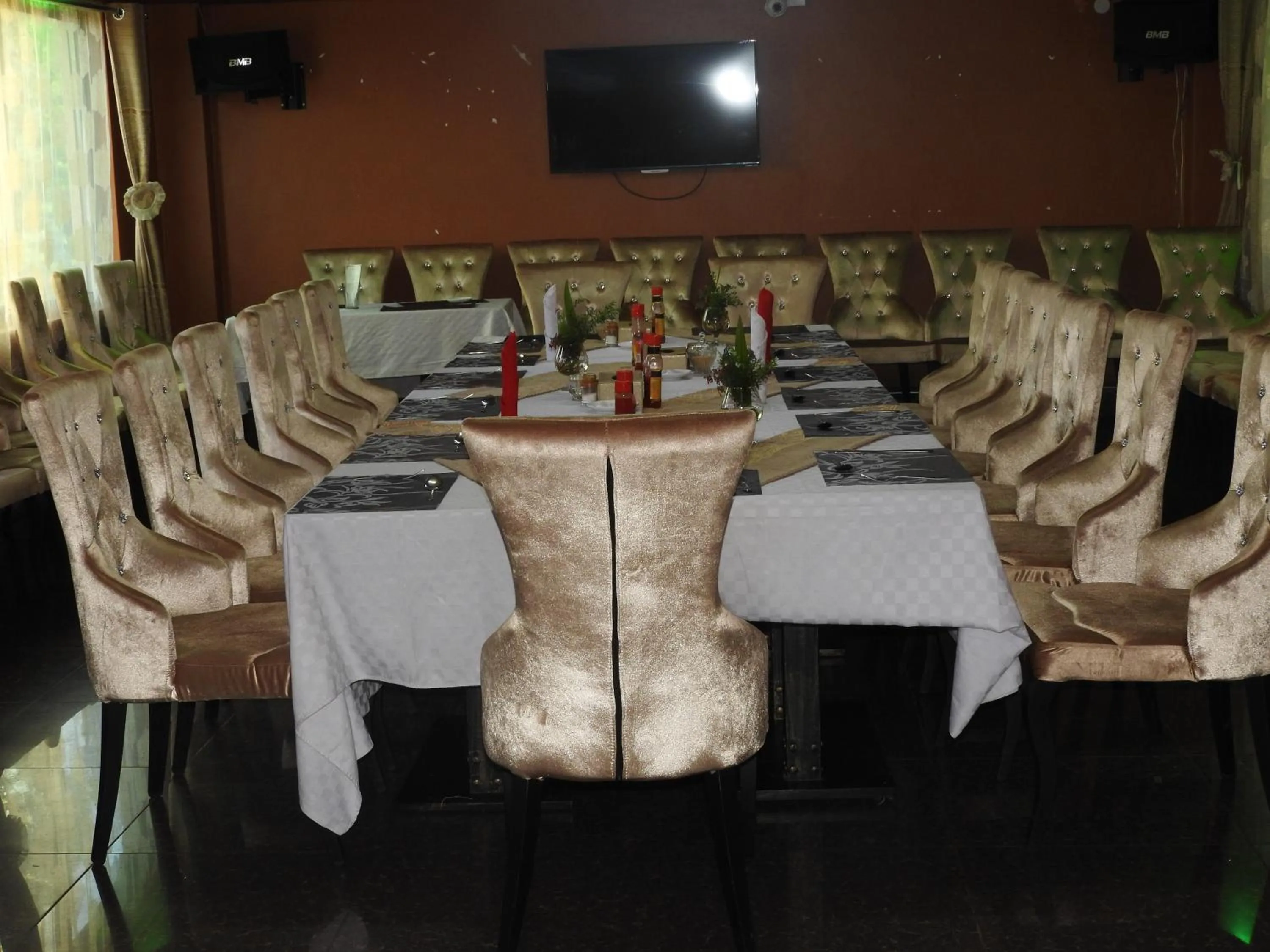 Seating area in Omega Gardens Hotel