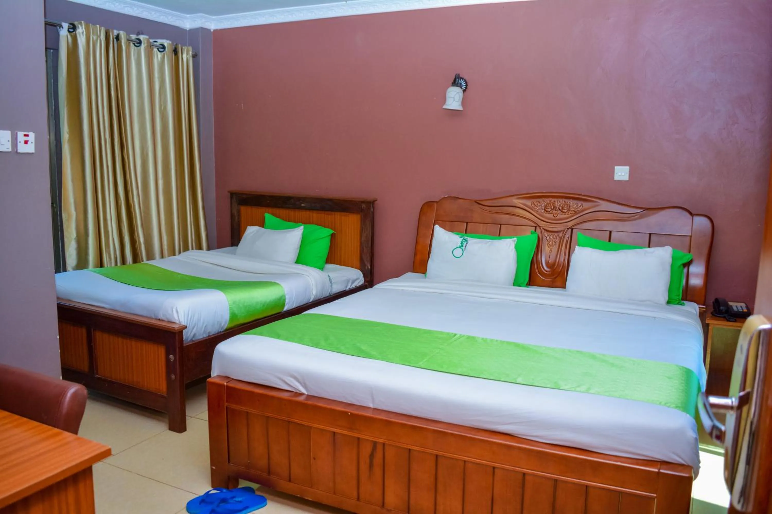 Bedroom in Omega Gardens Hotel