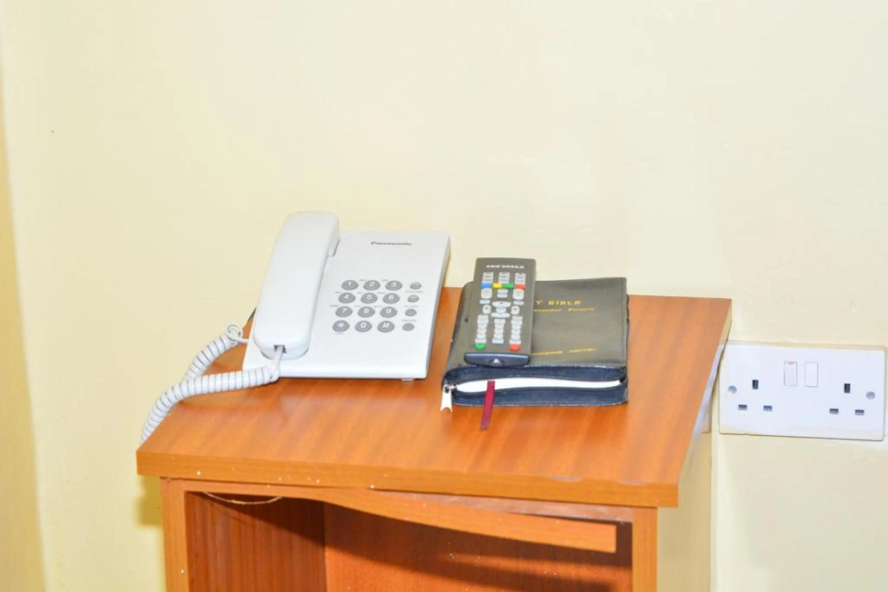 Bedroom in Omega Gardens Hotel