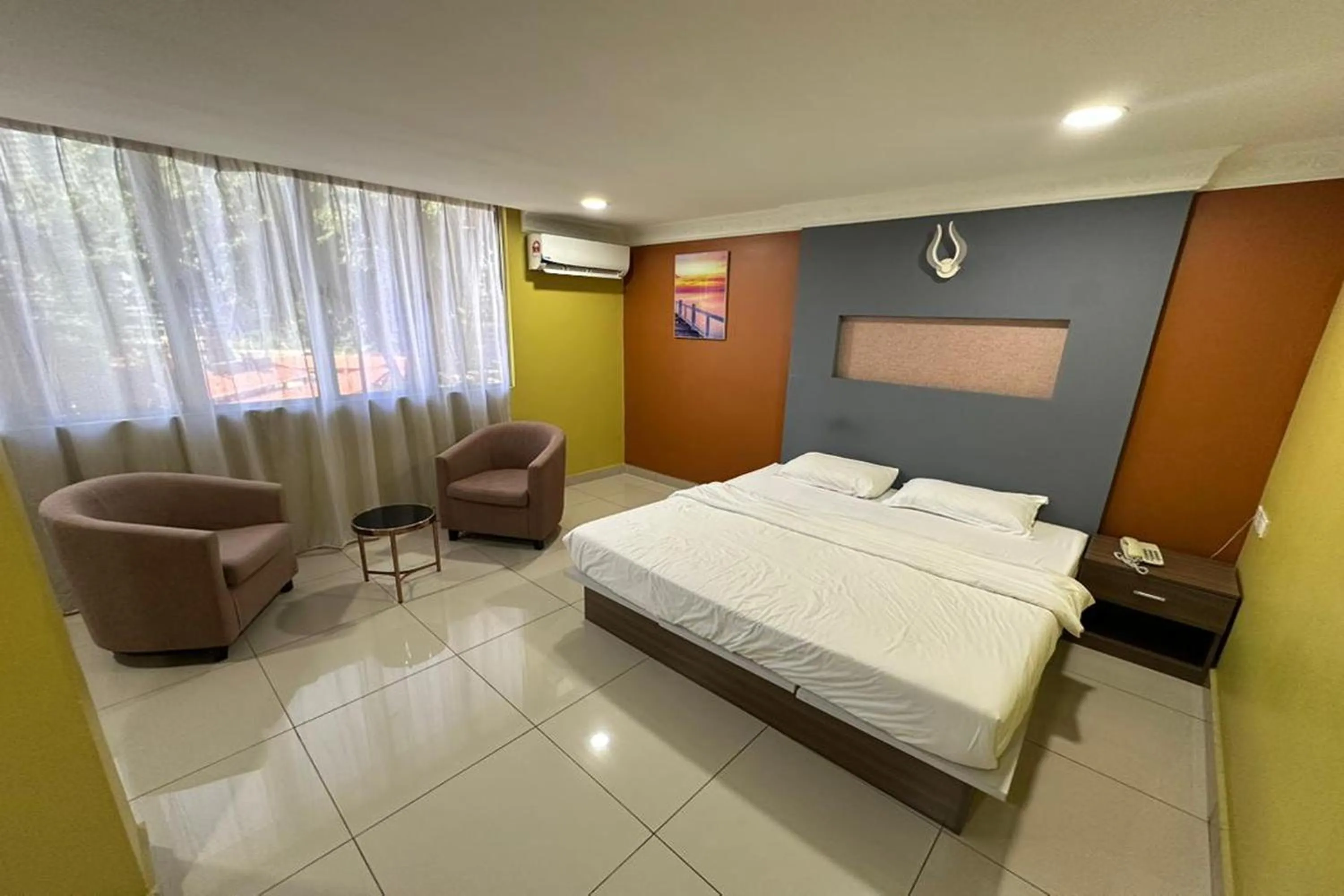 Bedroom, Bed in Poorna Hotel