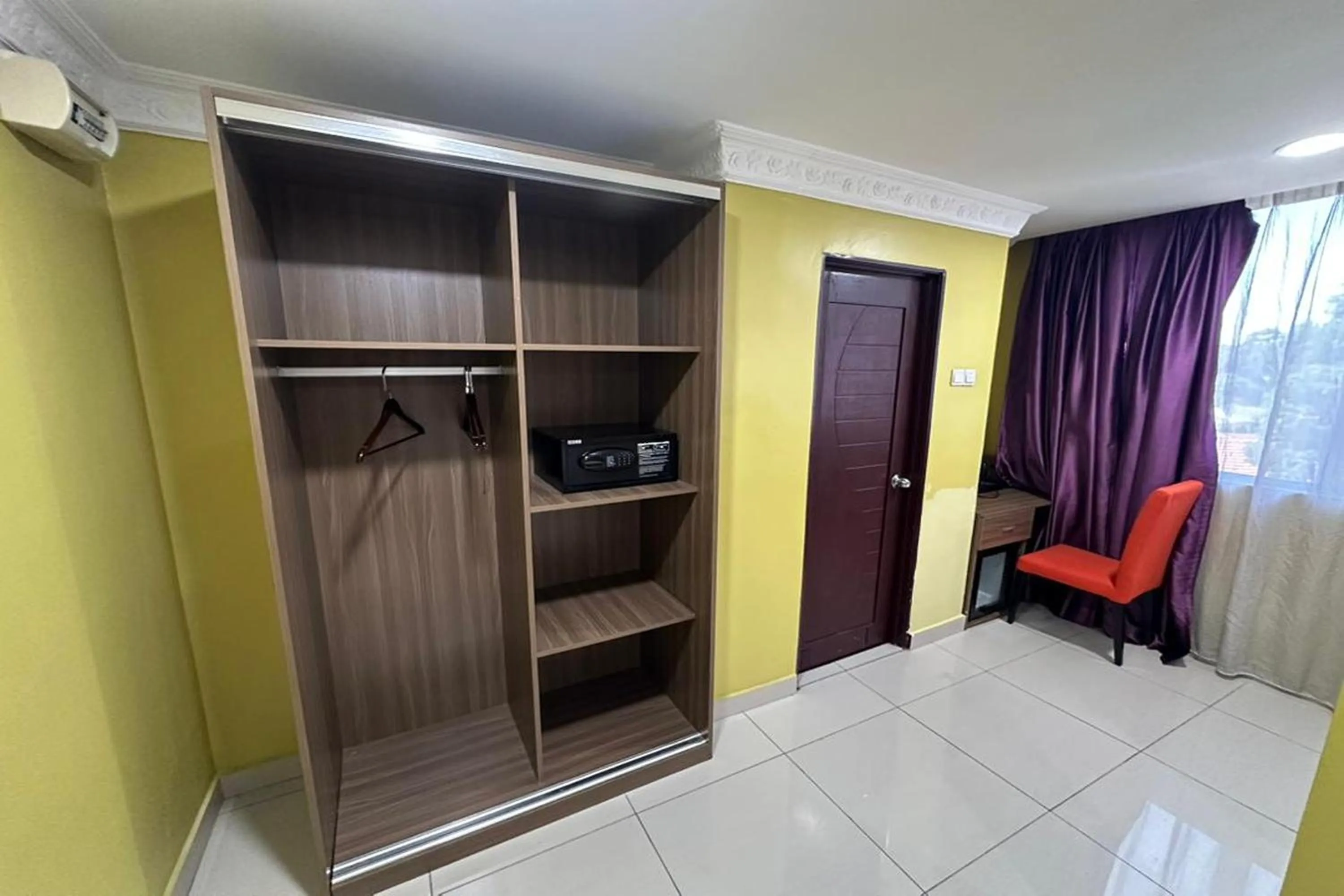 Bedroom in Poorna Hotel