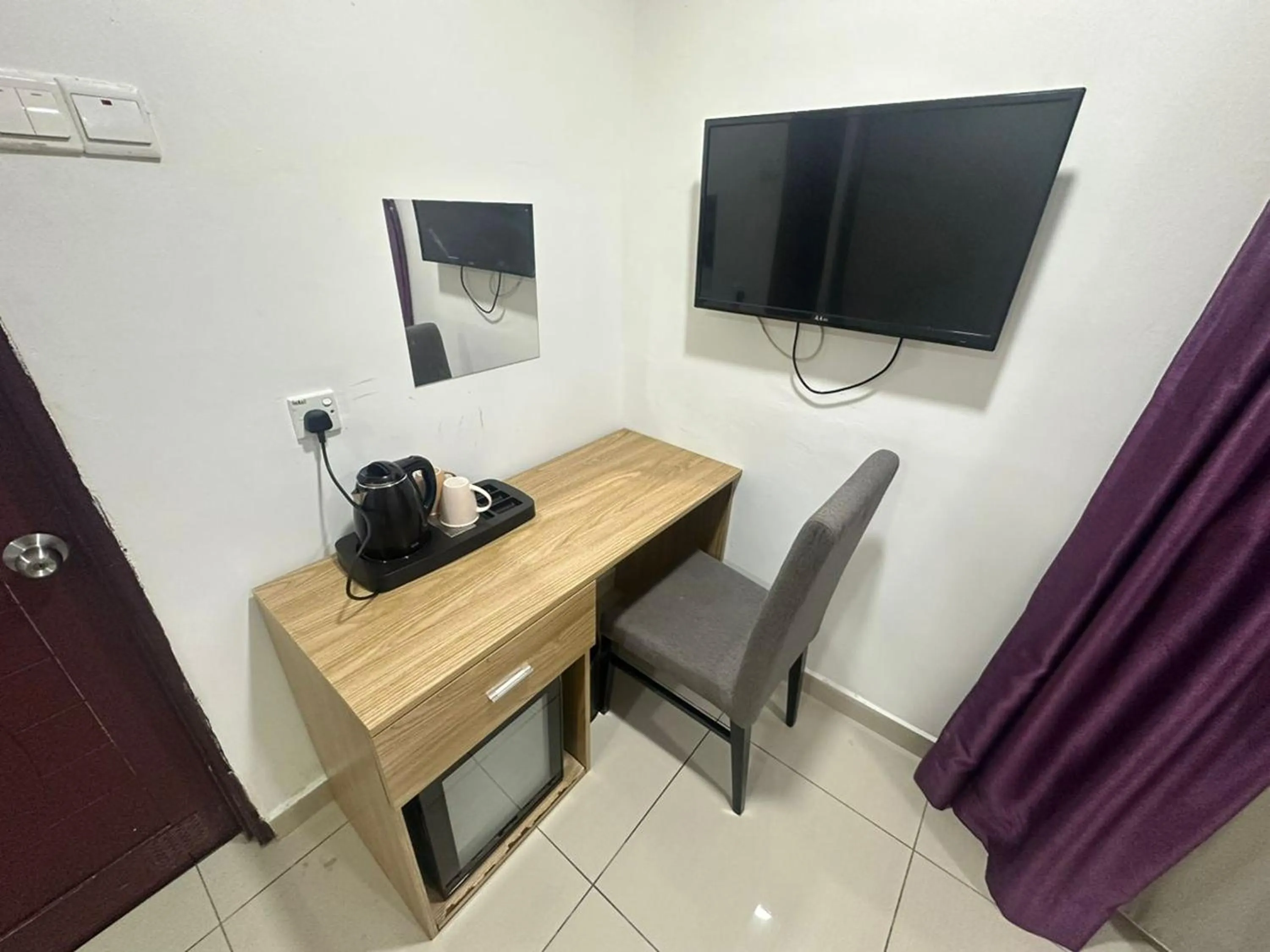 Bedroom in Poorna Hotel