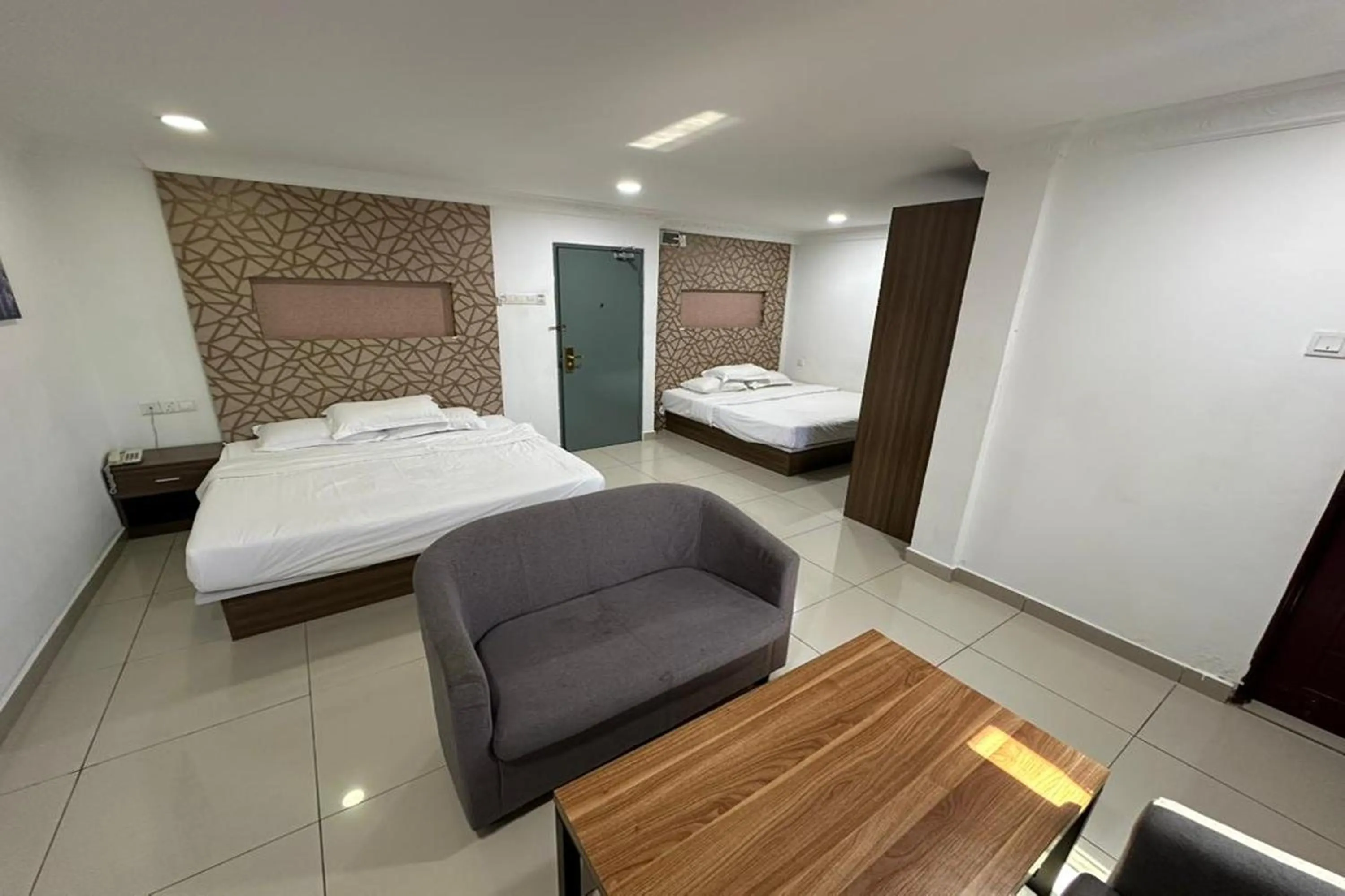 Bedroom, Bed in Poorna Hotel