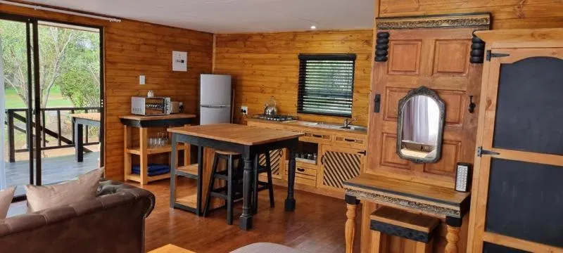 Kitchen or kitchenette in River Rock Lodge