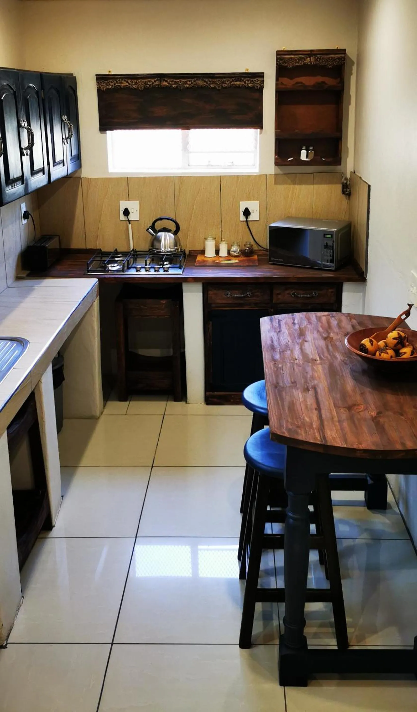 Kitchen or kitchenette in River Rock Lodge