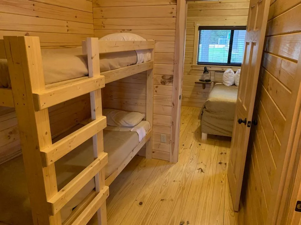 Bed in Beach House Lakeside Cottages