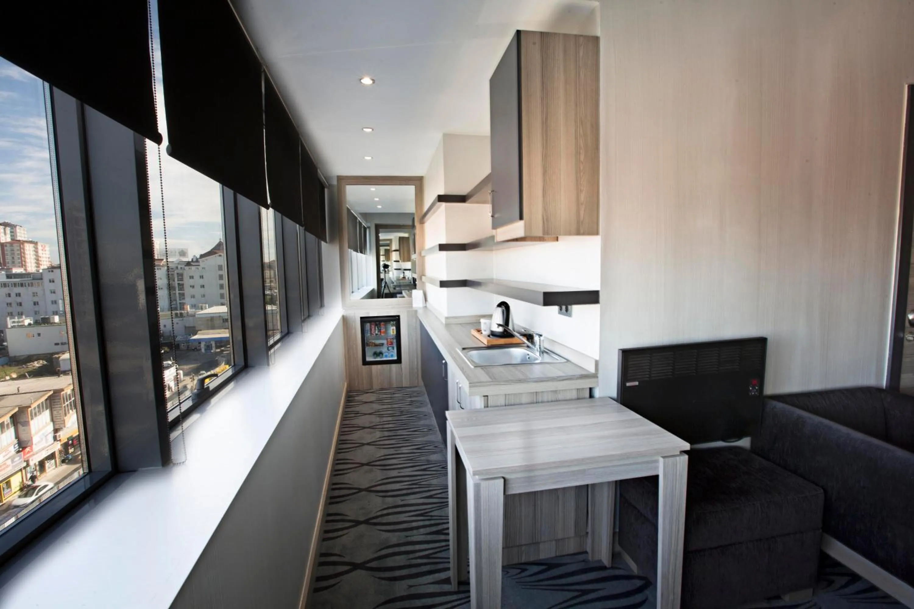 Kitchen or kitchenette in Akoni Hotel