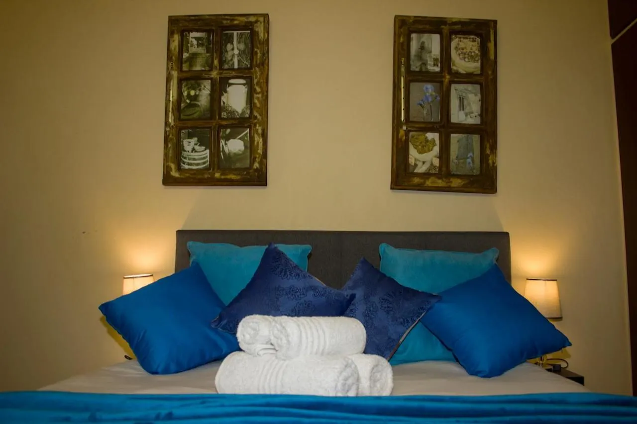 Bed in Echo Garden Guesthouse