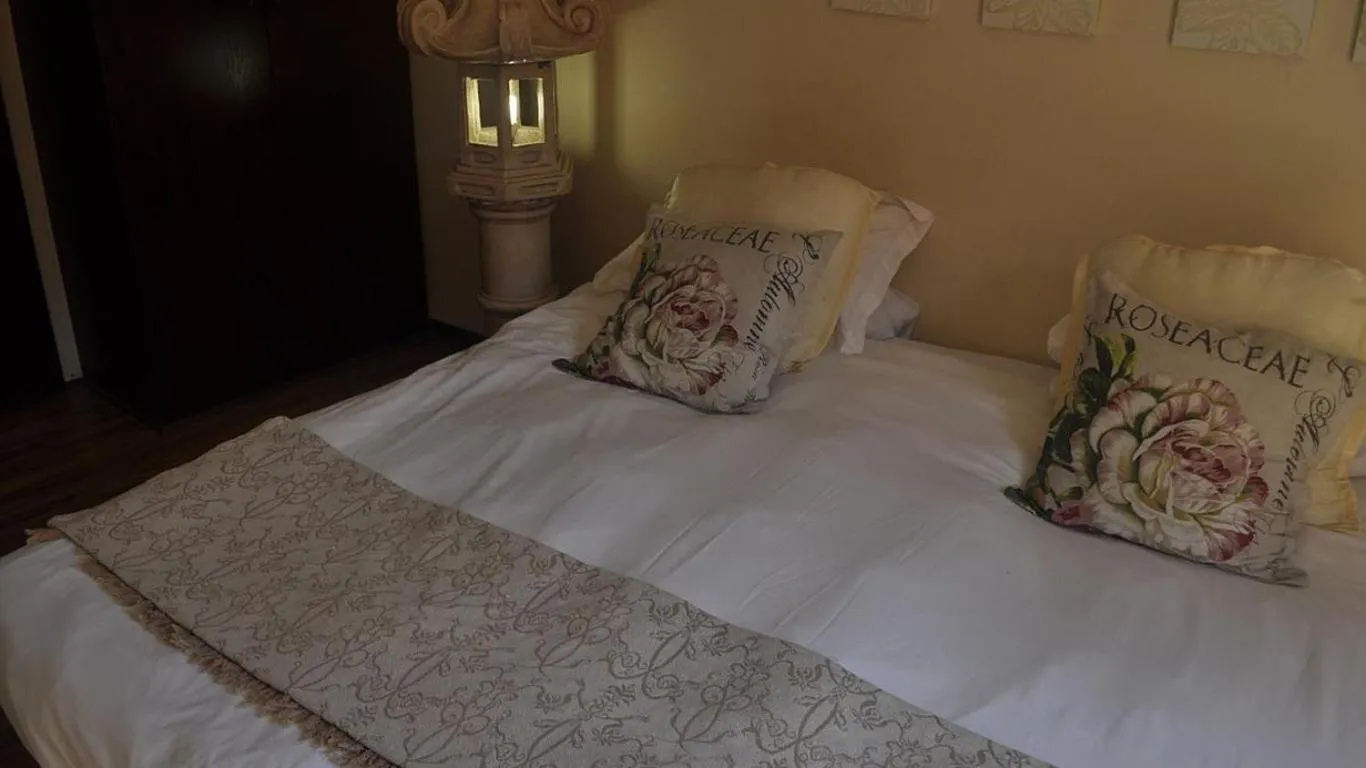 Bed in Echo Garden Guesthouse