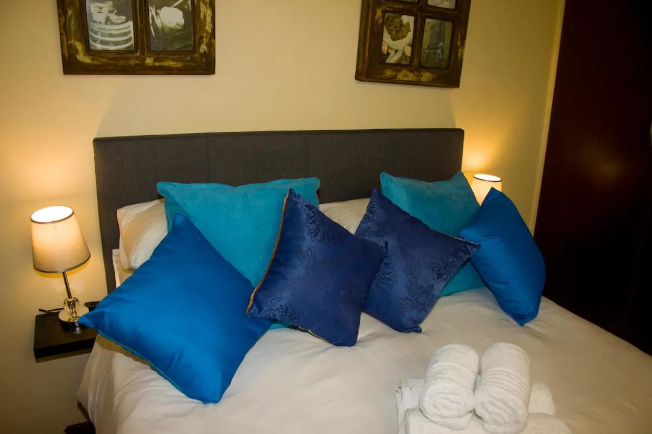 Bed in Echo Garden Guesthouse