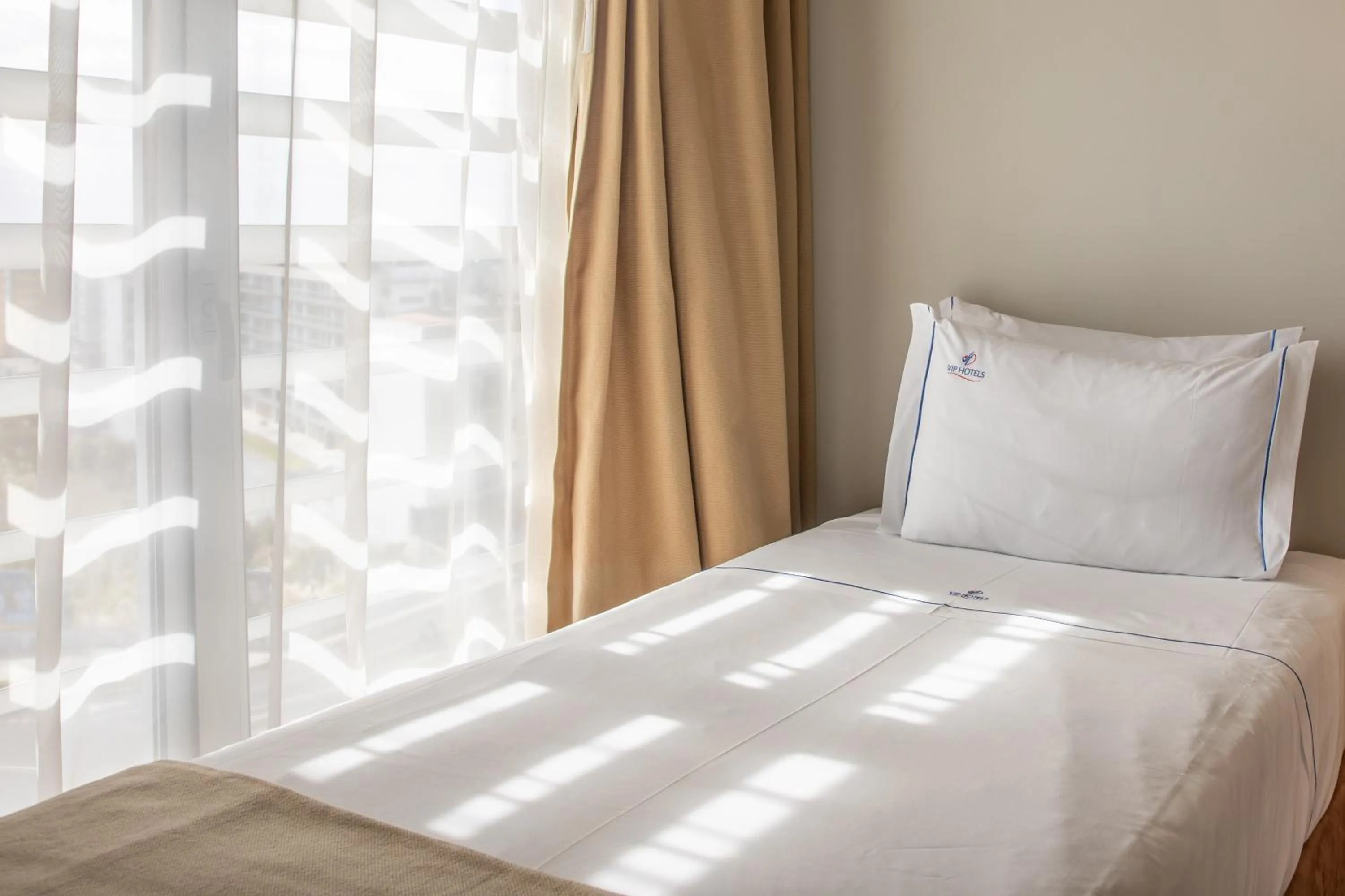 Bedroom, Bed in VIP Executive Azores Hotel