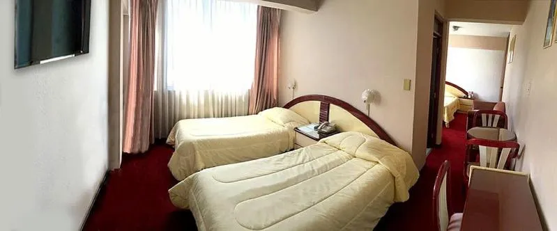 Bed in Americana Hotel